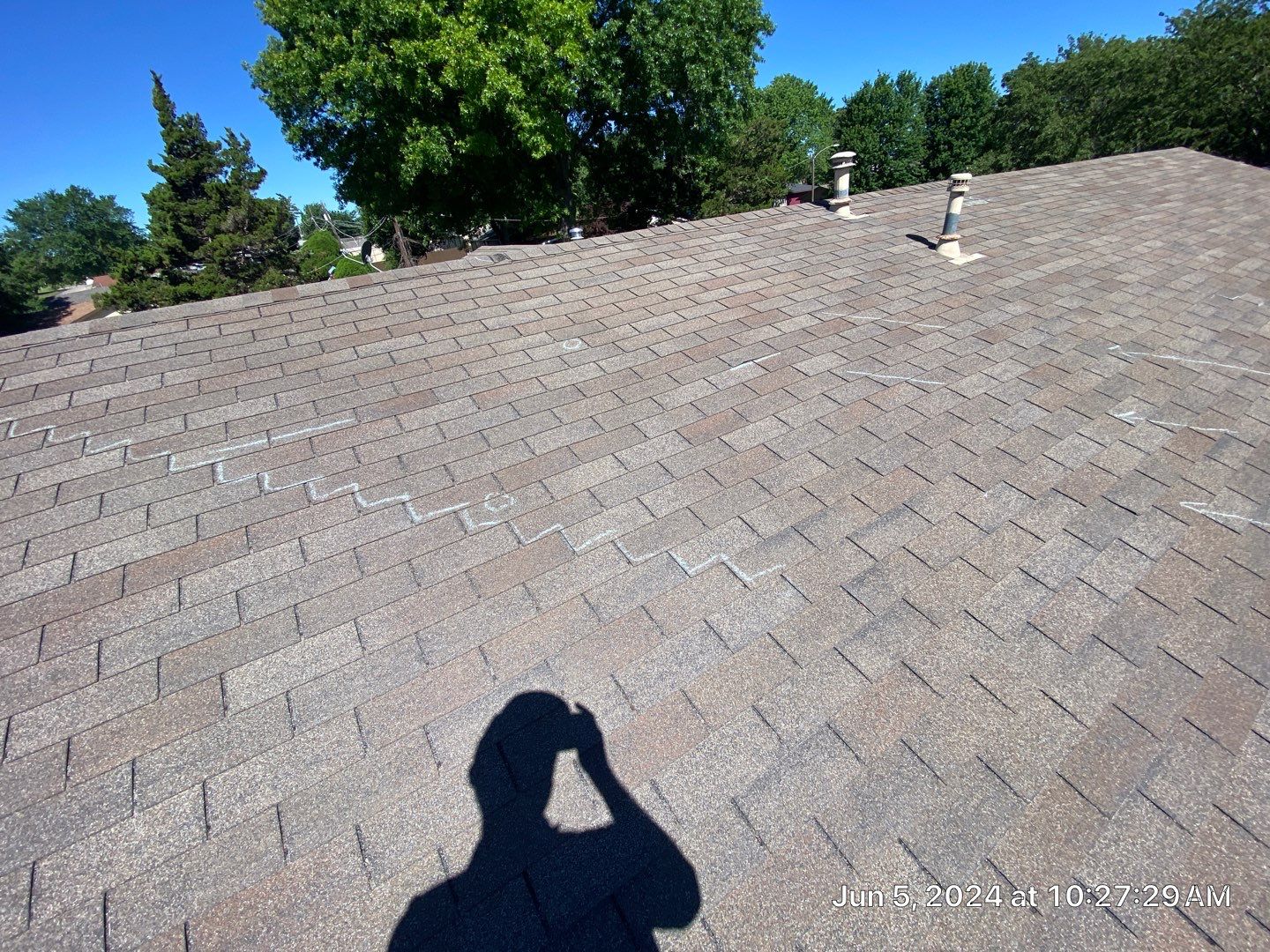 Roof inspection in Bartlesville by Decor Roofing & Restoration