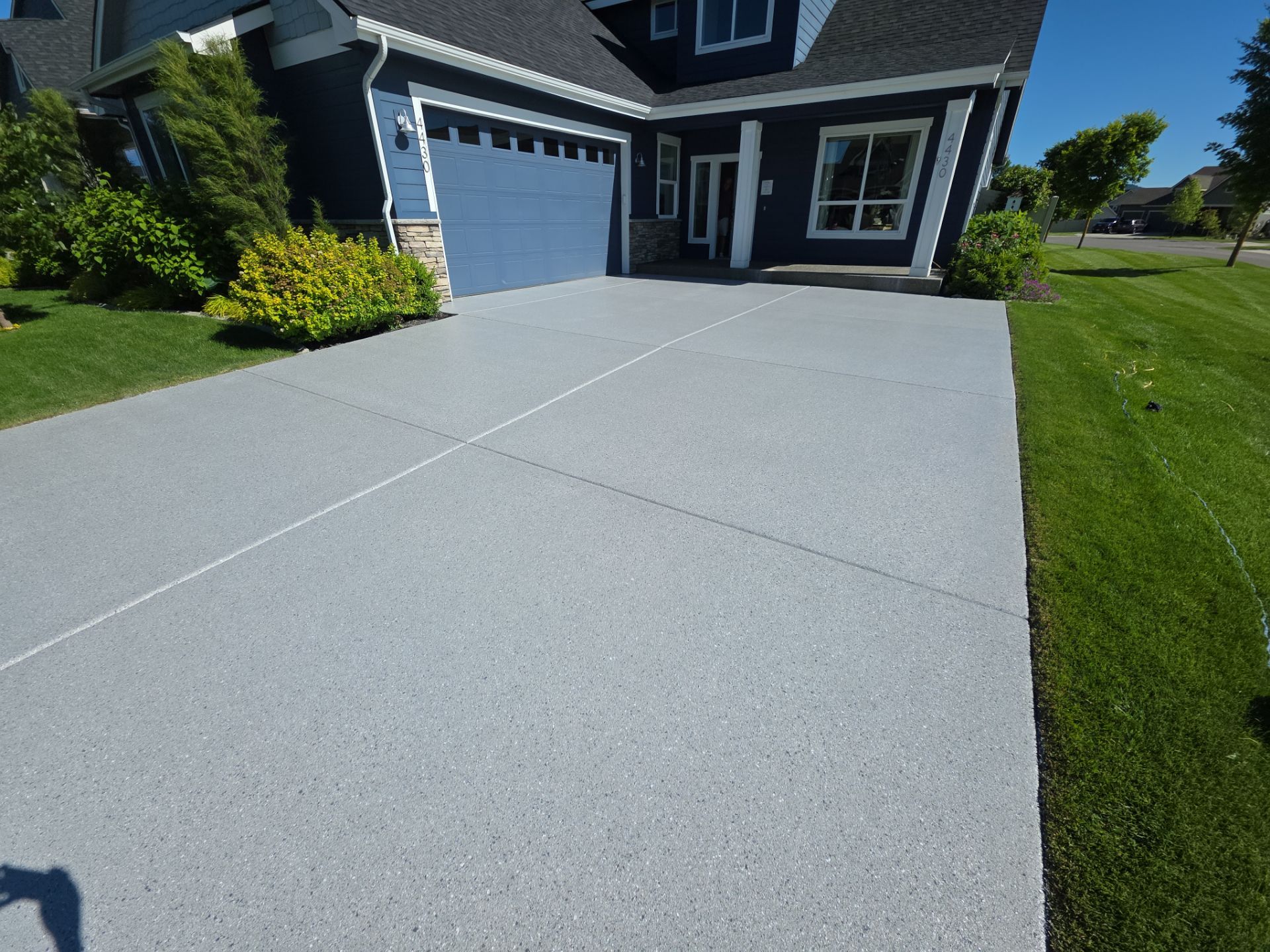 Battleship Hybrid Concrete Coating for Post Falls Patio and Driveway by Croc Coatings, LLC
