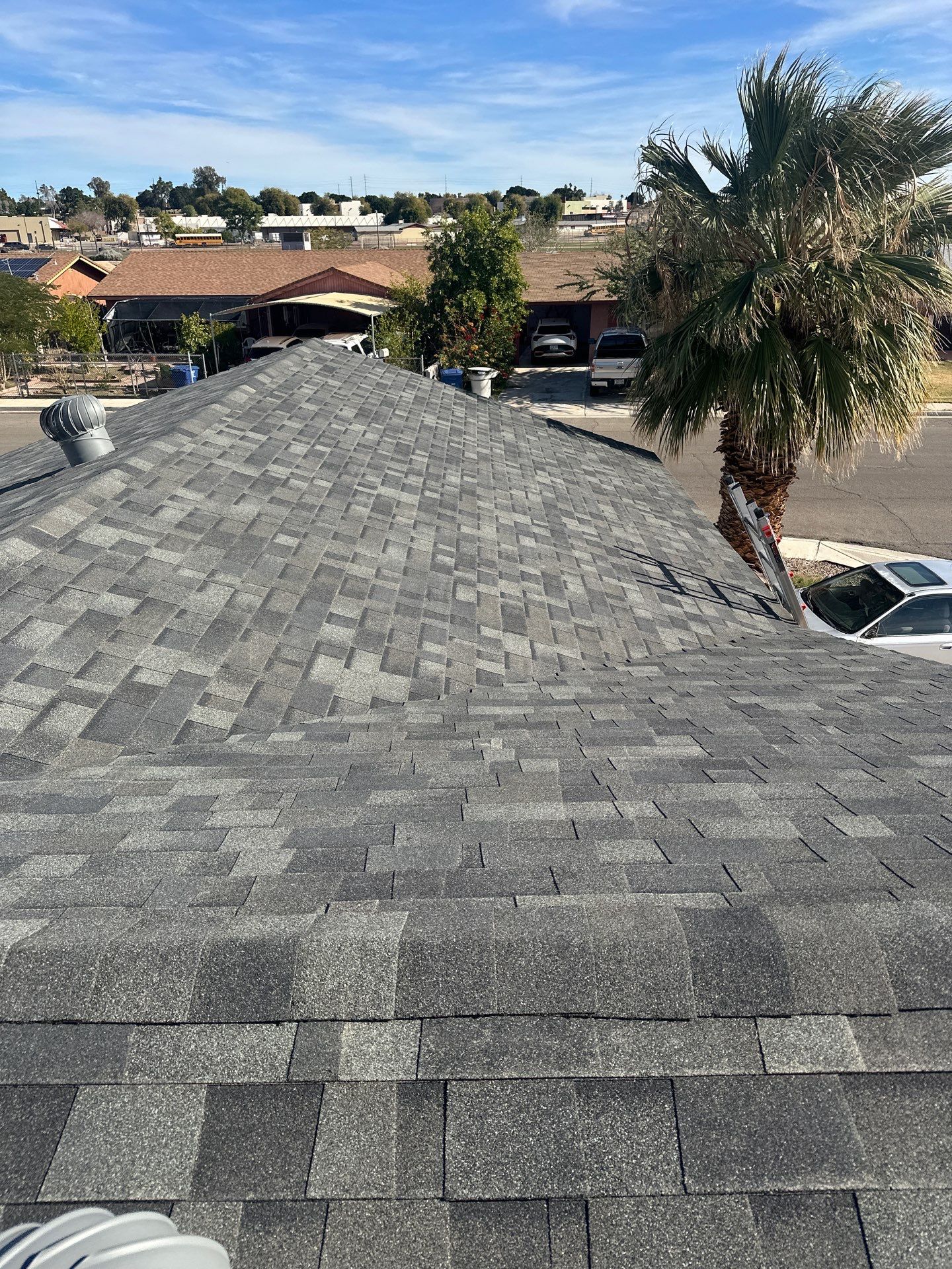 Estate Gray Shingles by Reimagine Roofing