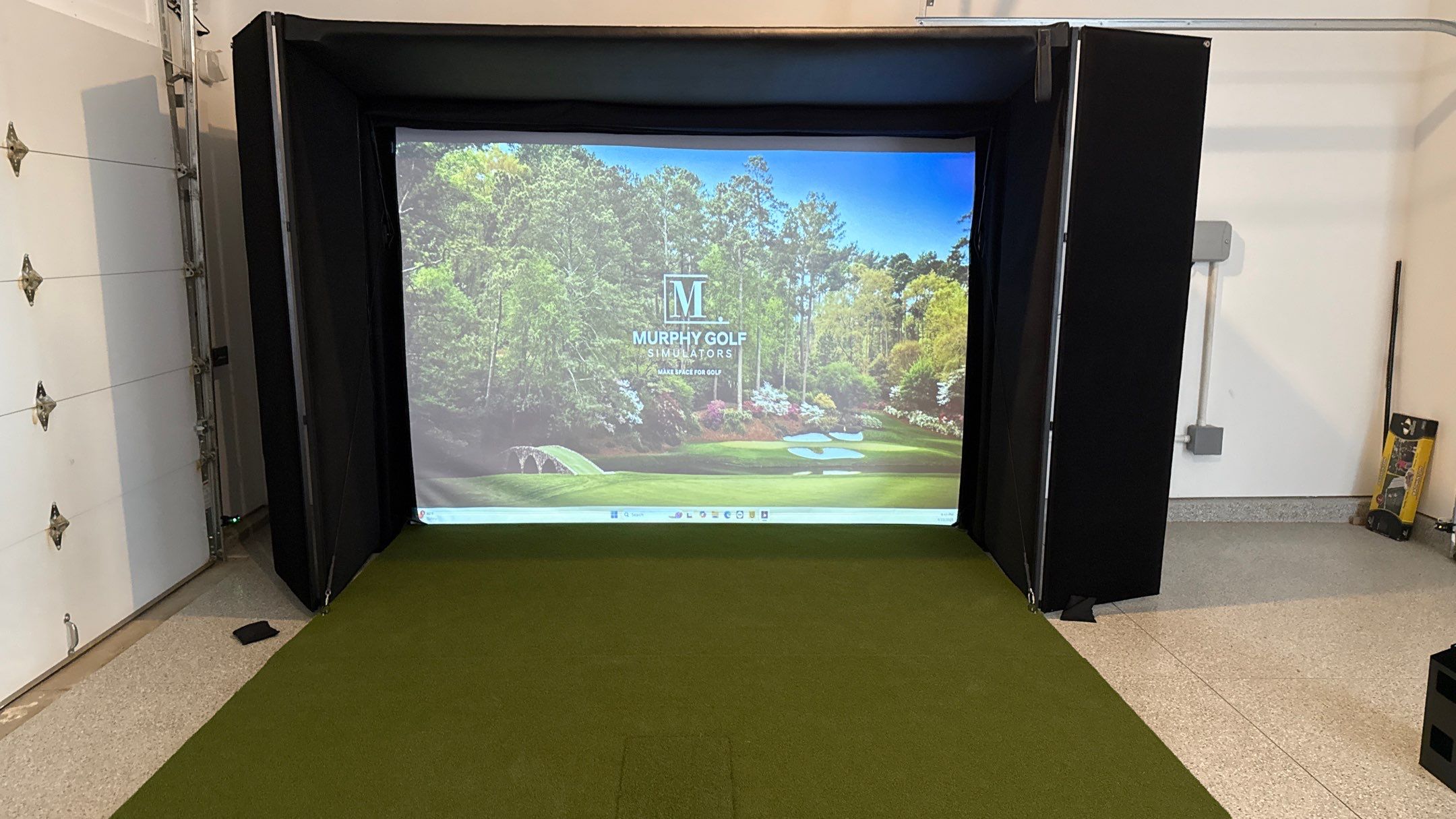 Ben Took It To The Next Level With a Golf Simulator by Banner Garage