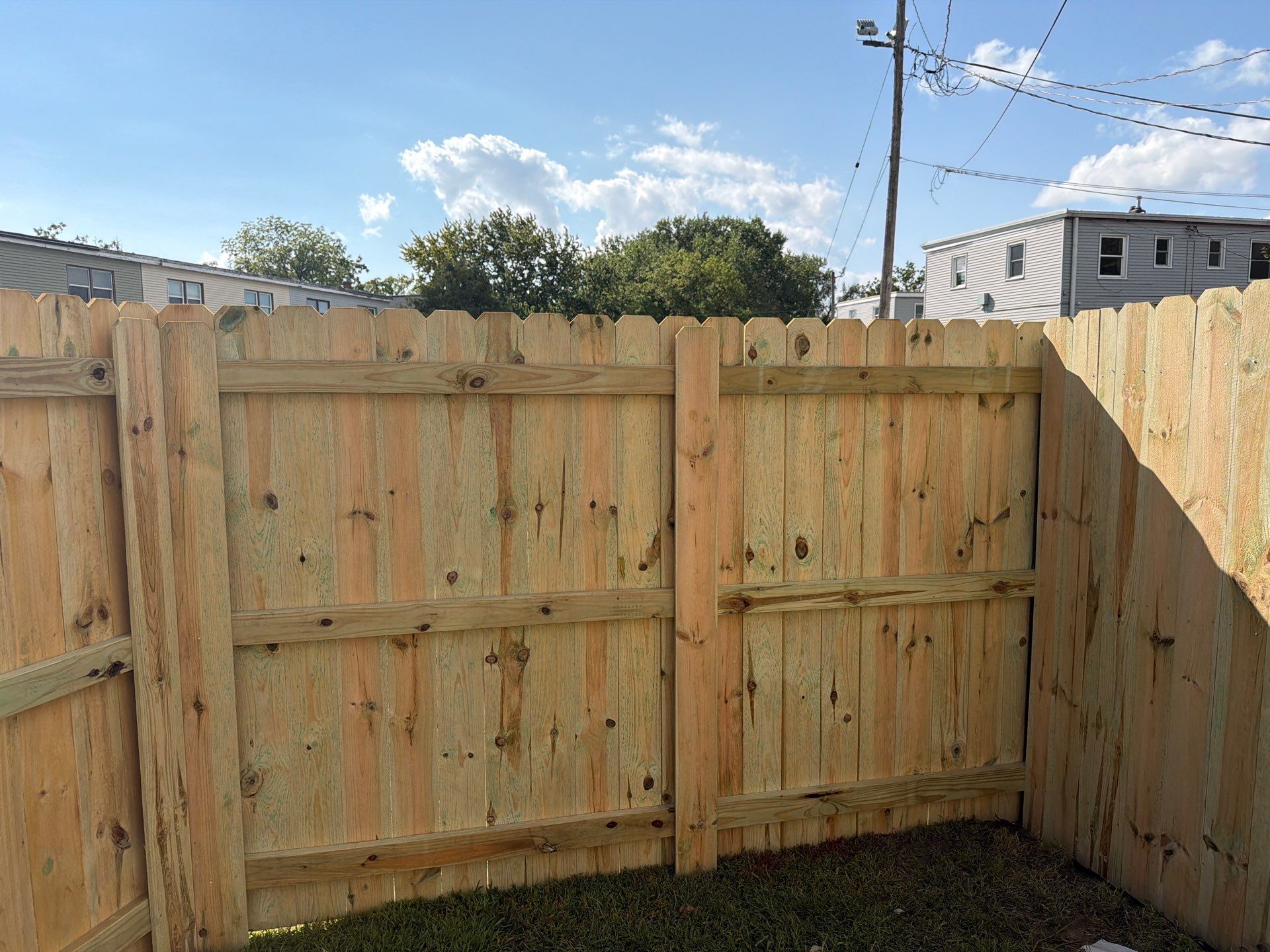 New Treated Wood Privacy Fence and Metal-Framed Gates by Perfect Picket Fence and Stain