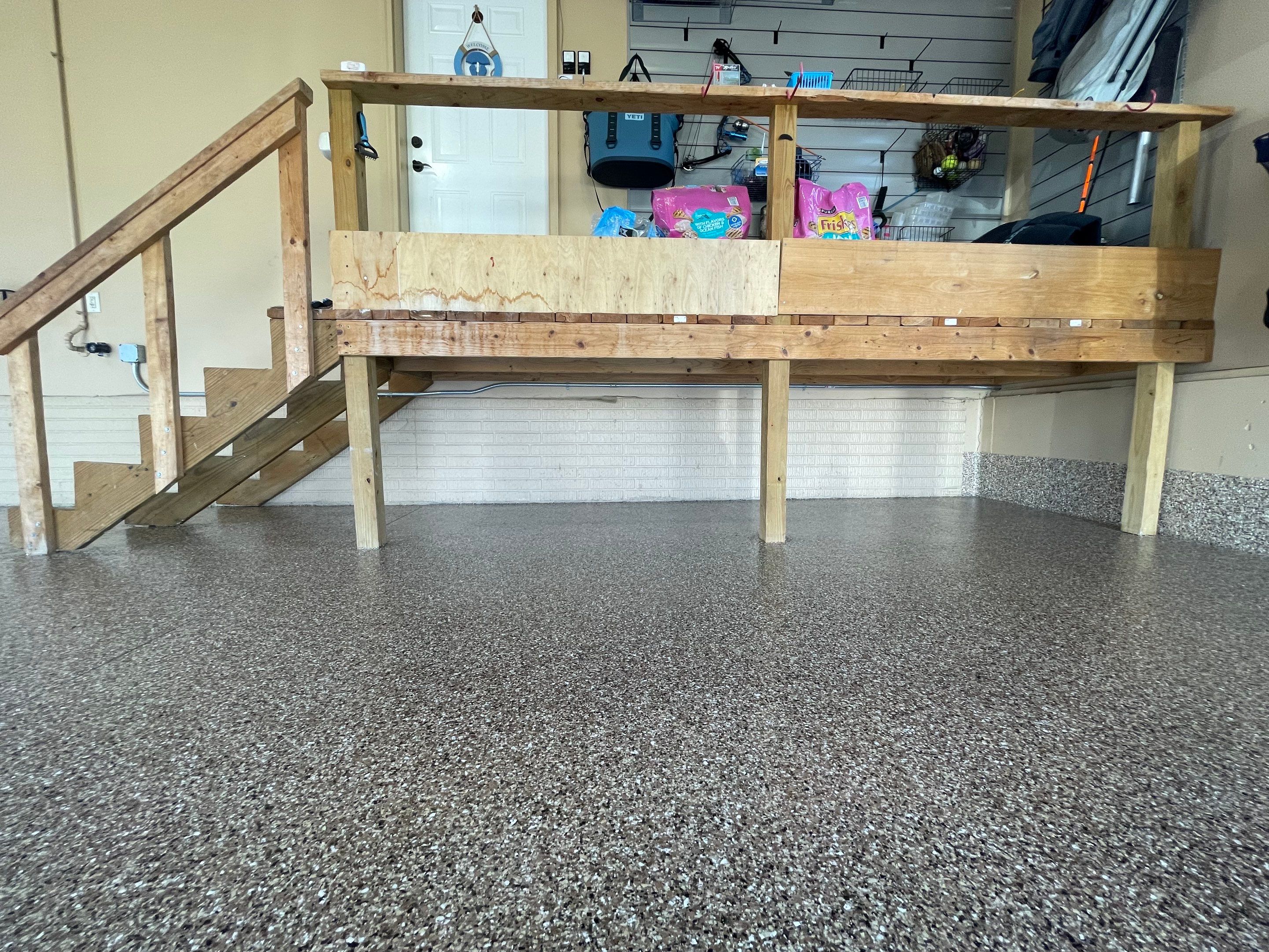Residential Garage Floor Transformation with Speckled Epoxy Coating by Select Painting, Coatings & Garage Cabinets