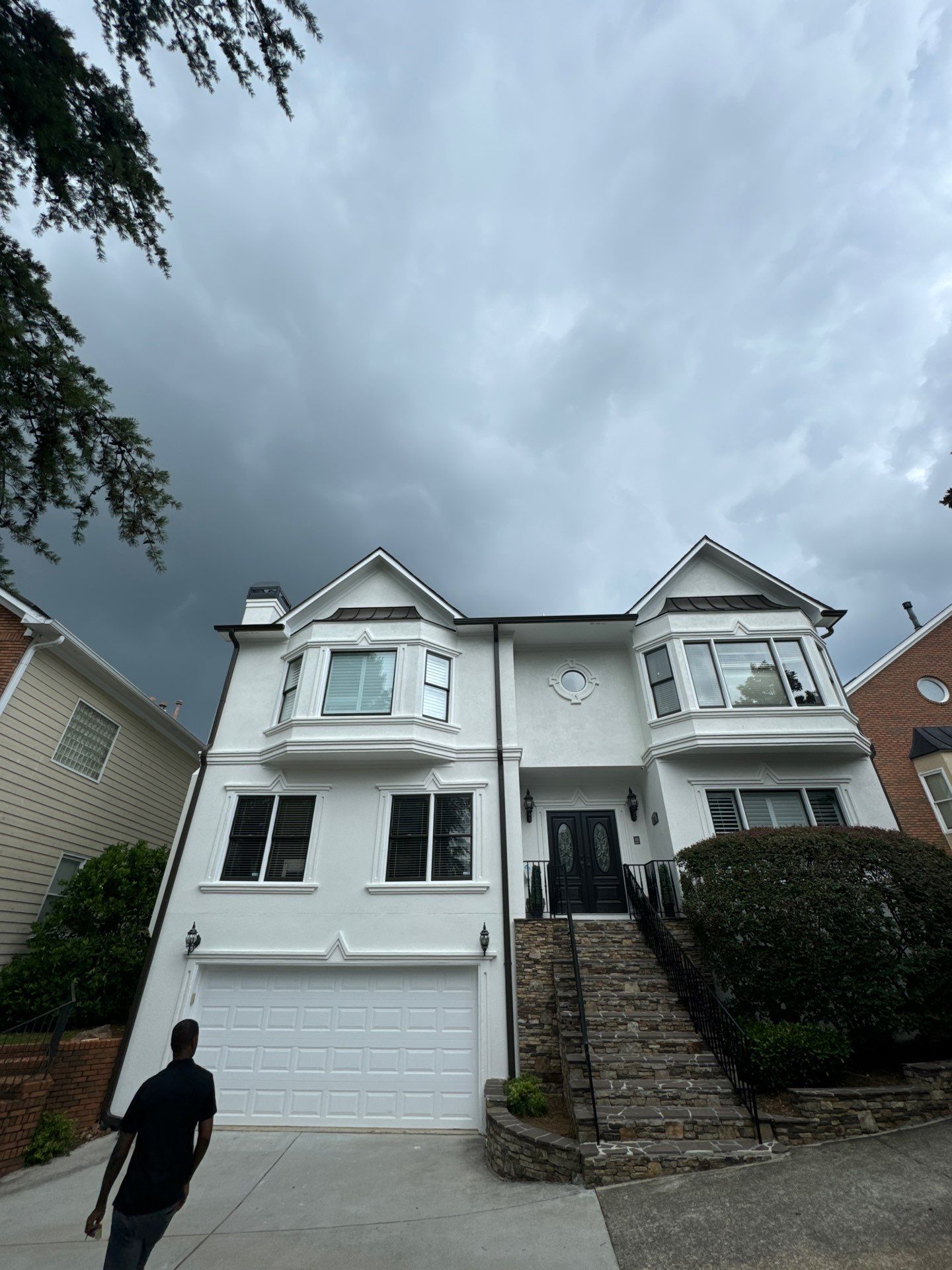 Full Exterior Stucco Painting and Wood Deck Staining in Atlanta by Swift Home Renovations