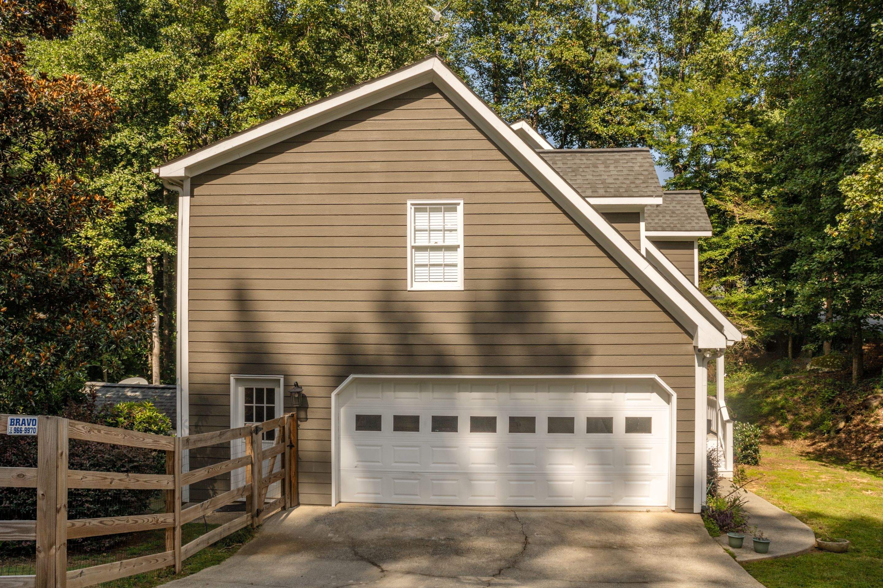 Marietta, GA Full Siding Replacement, 30+ Window Replacements, Screened-In Porch to Sunroom Conversion, Gutter Replacement, and Exterior Painting by Nelson Exteriors