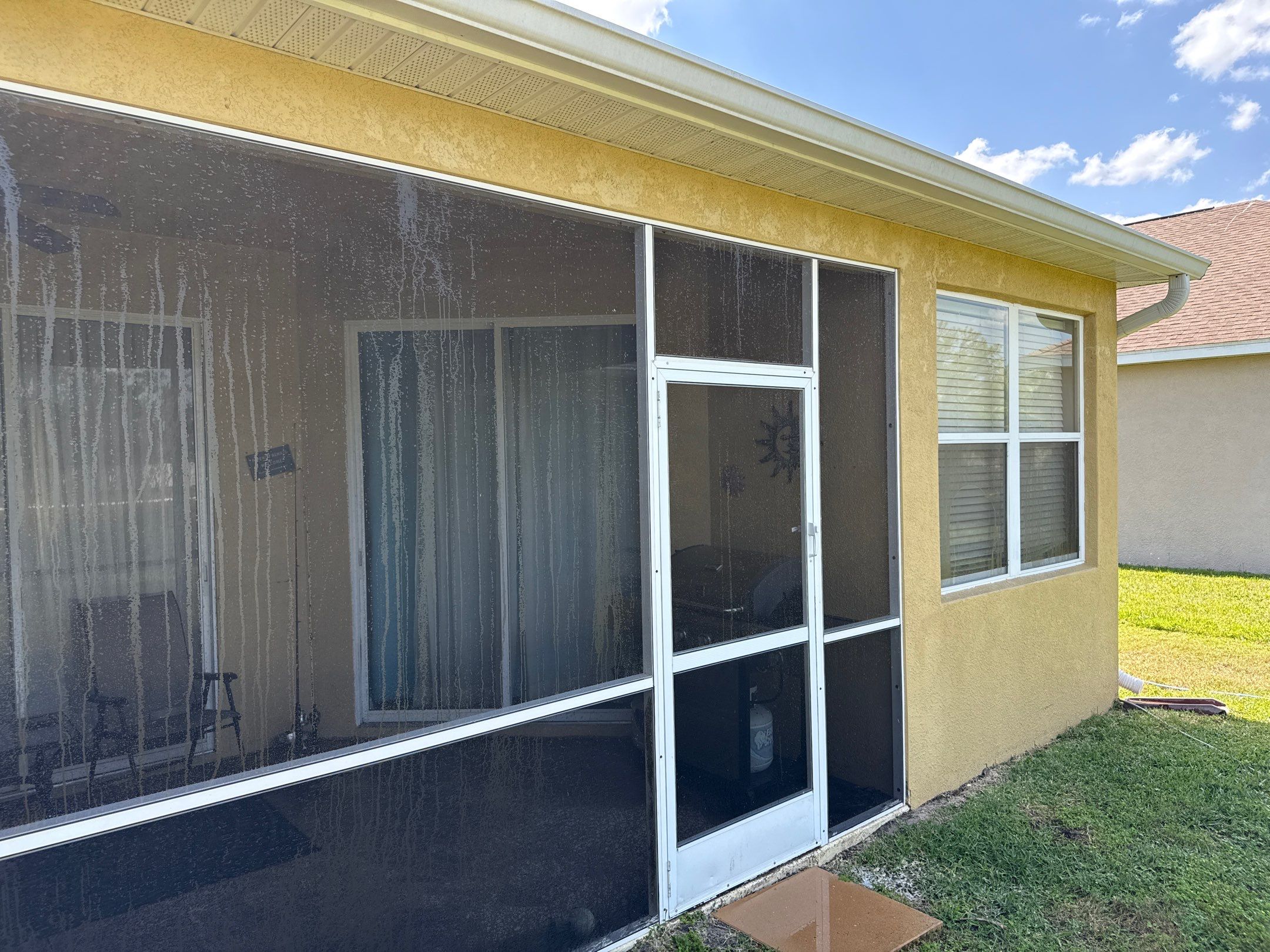 Driveway & Rear Wall Soft Wash | Lexington Community | Parrish, FL | Sunshine AquaWash by Sunshine AquaWash