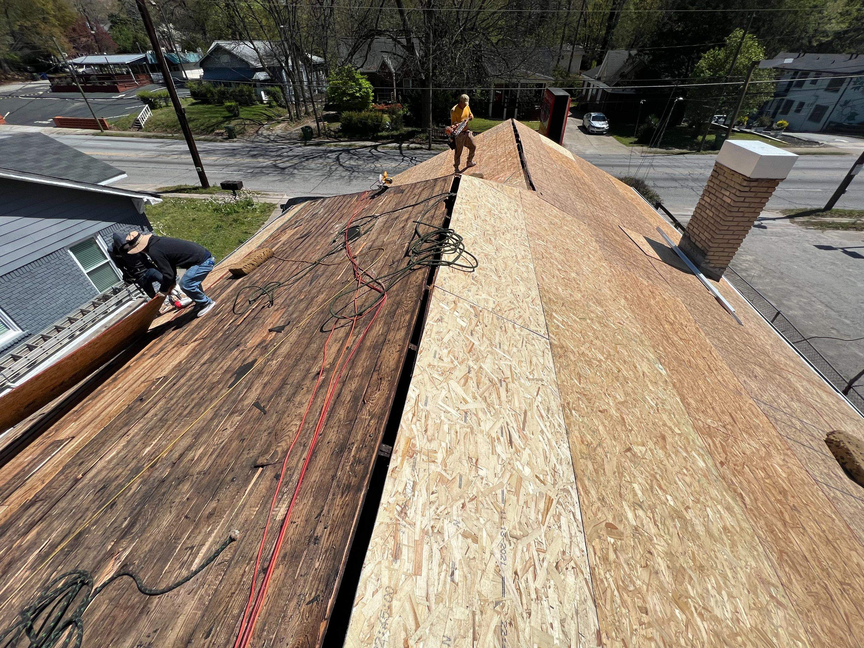 memorial tattoo roof & gutter replacement by Nailed It Roofing & Remodeling LLC