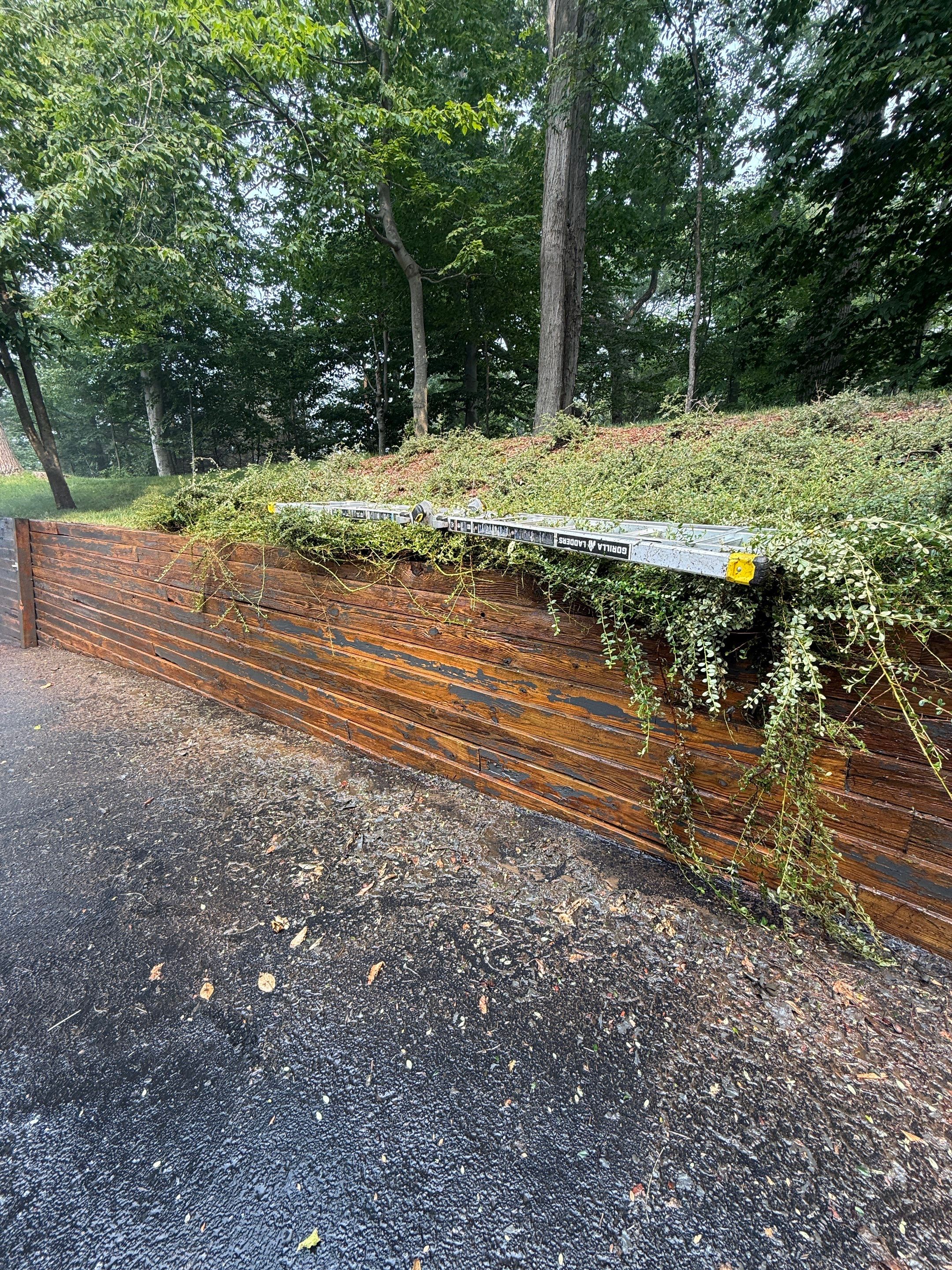 Exterior Retaining Wall Painting | Grand Haven, Michigan by Gordon Painting