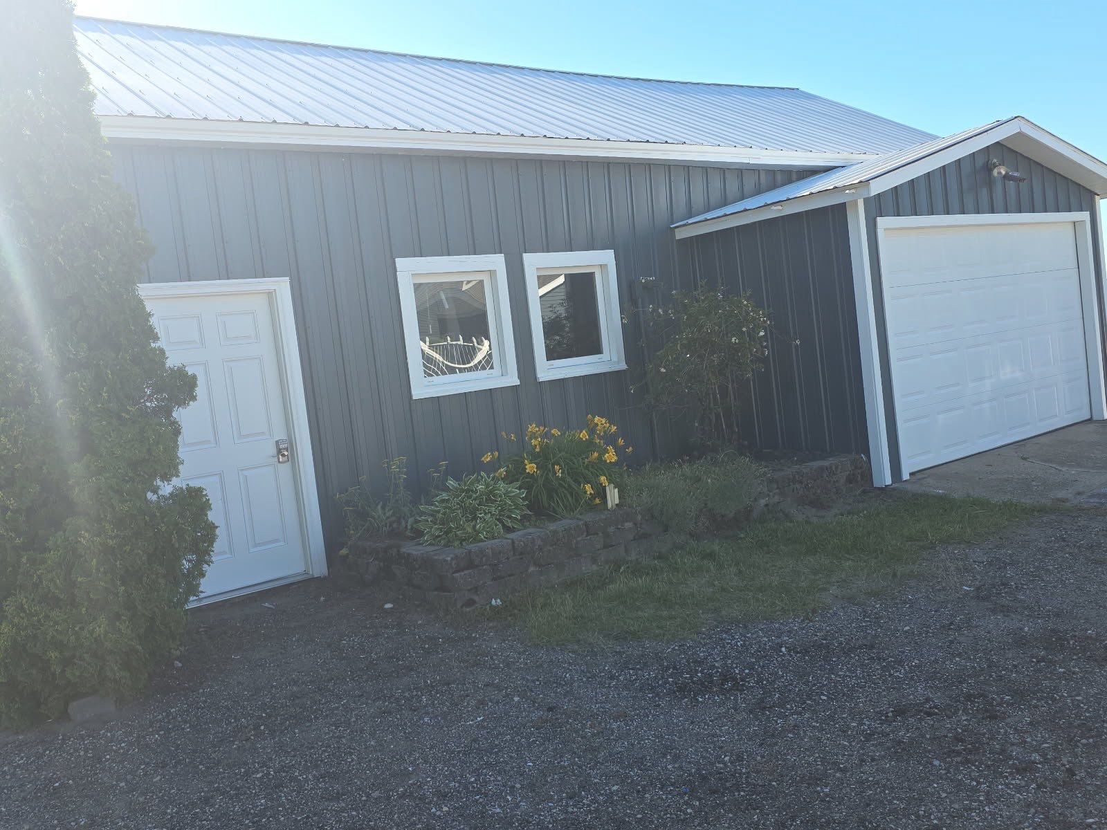Exterior Painting and Trim Restoration for Mears Metal Buildings by Gordon Painting