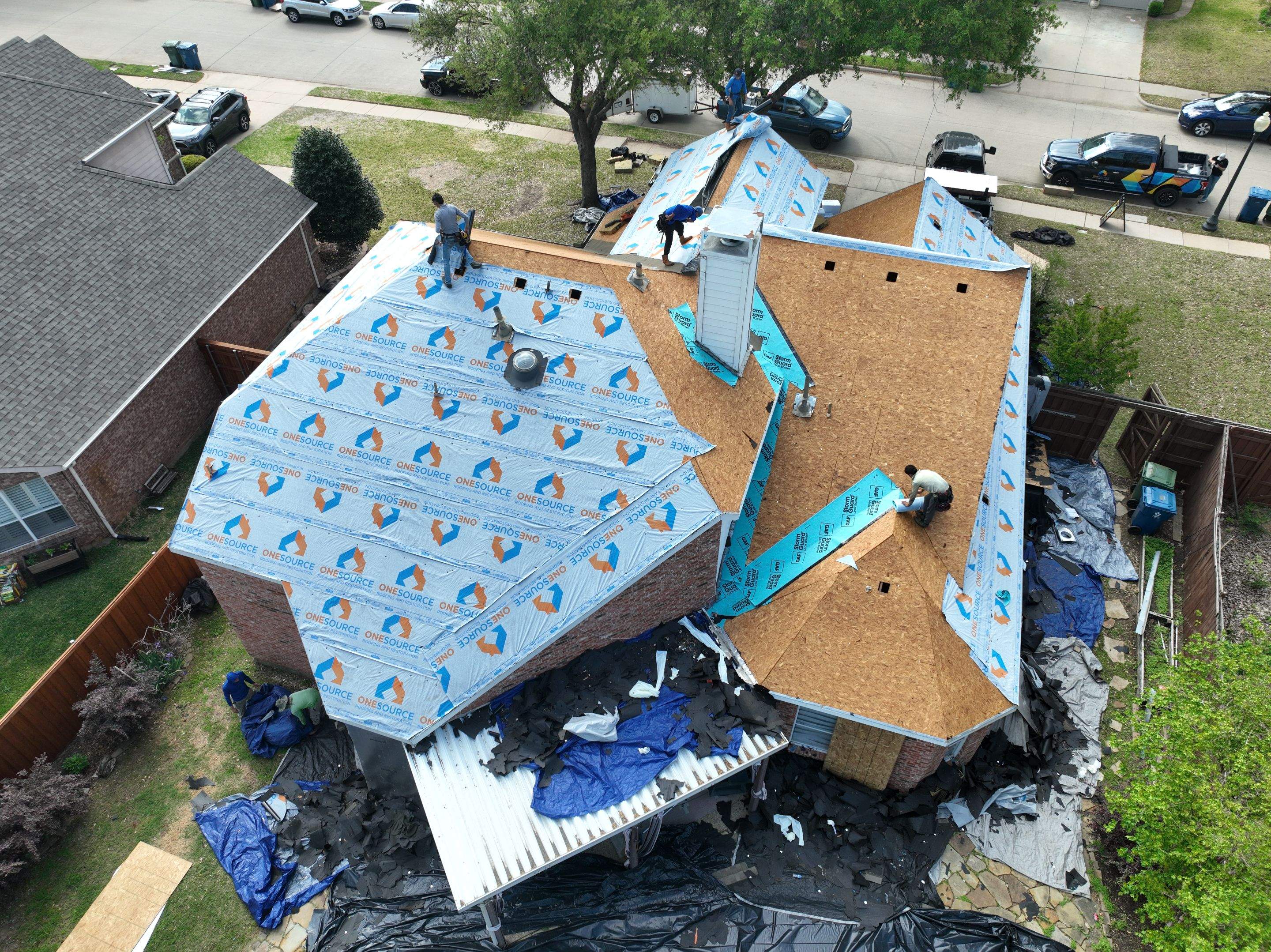 Residential Roofing Installation using IKO Nordic Granite Black by OneSource Roofing and Restoration