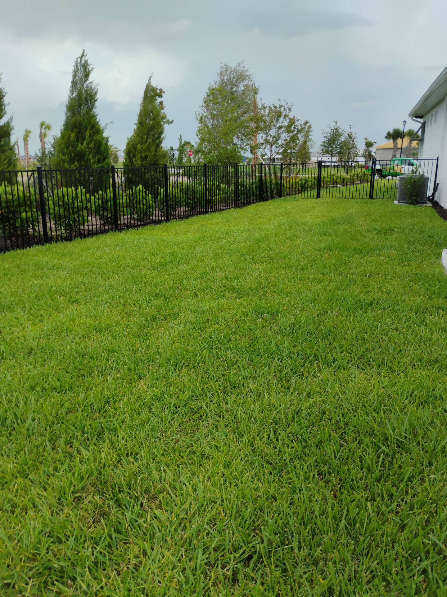 Black Aluminum Picket Fence Installation in Venice, Florida by True Fence LLC