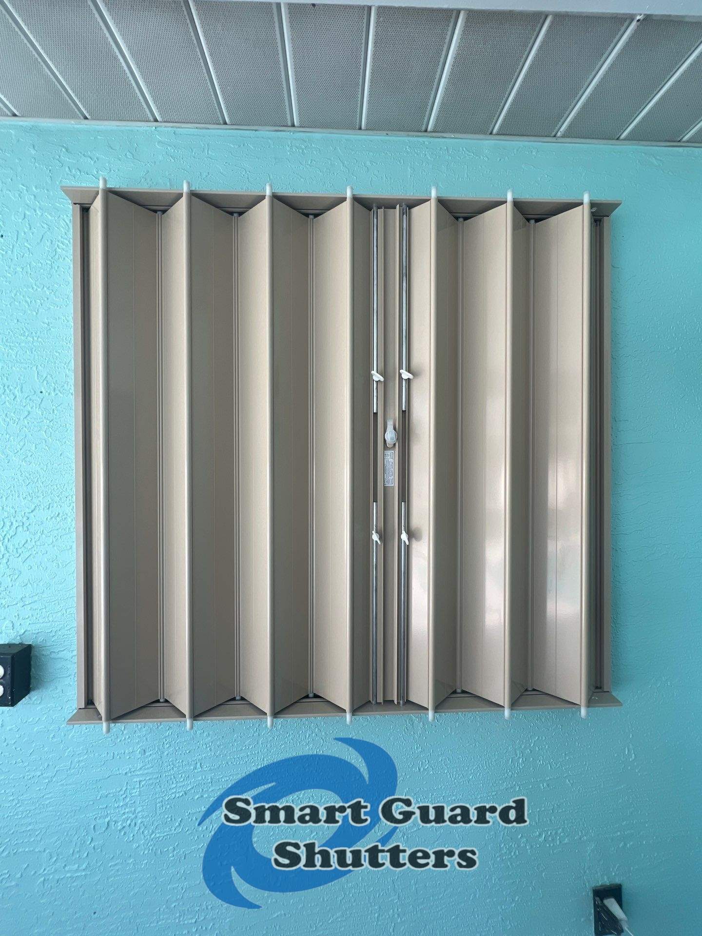 Hurricane Protection in Beige  by Smart Guard Shutters