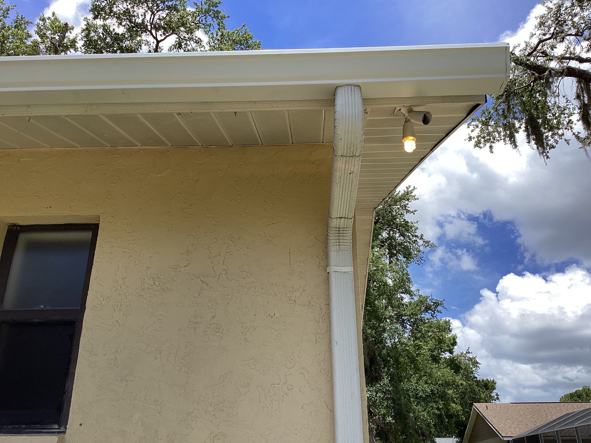 New Soffit and Fascia and White Gutters  by Gutter Professors