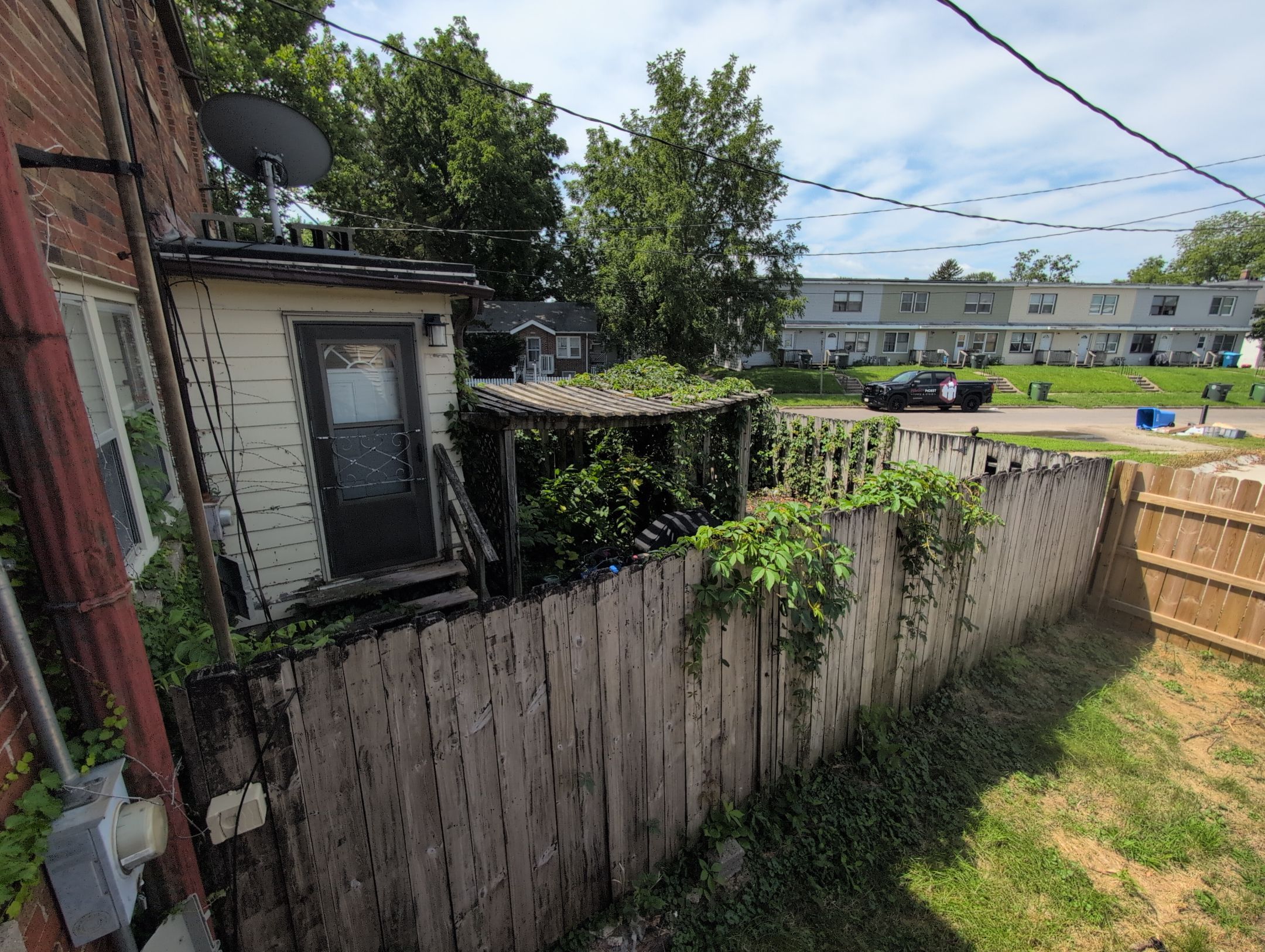 New Treated Wood Privacy Fence and Metal-Framed Gates by Perfect Picket Fence and Stain