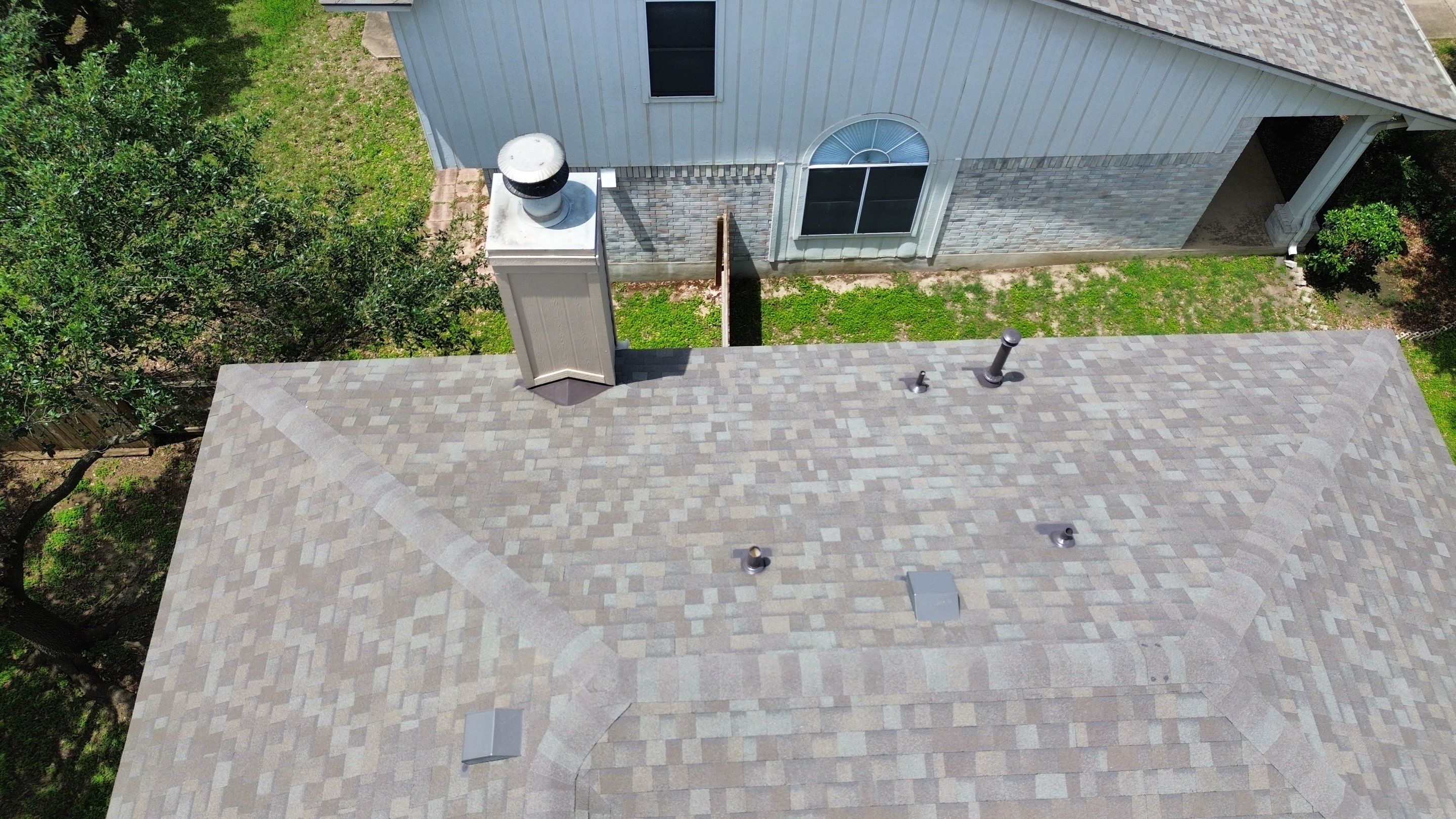 Roof Replacement & Chimney Cricket Upgrade in Cedar Park, TX by Kstylez Roofing & Construction