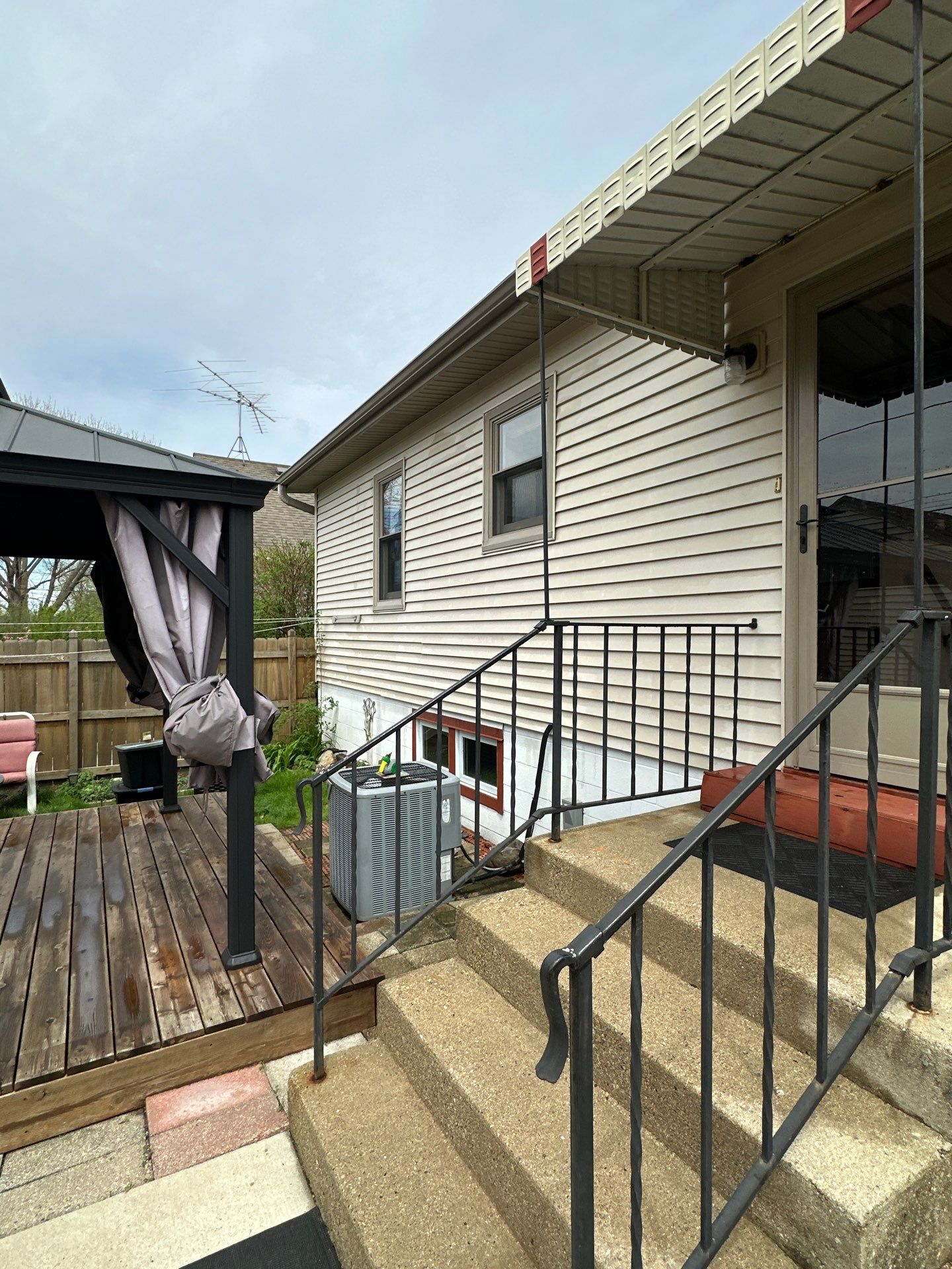 New Wooden Deck and Front Entry Stair Installation in Milwaukee by OCS Contracting Services