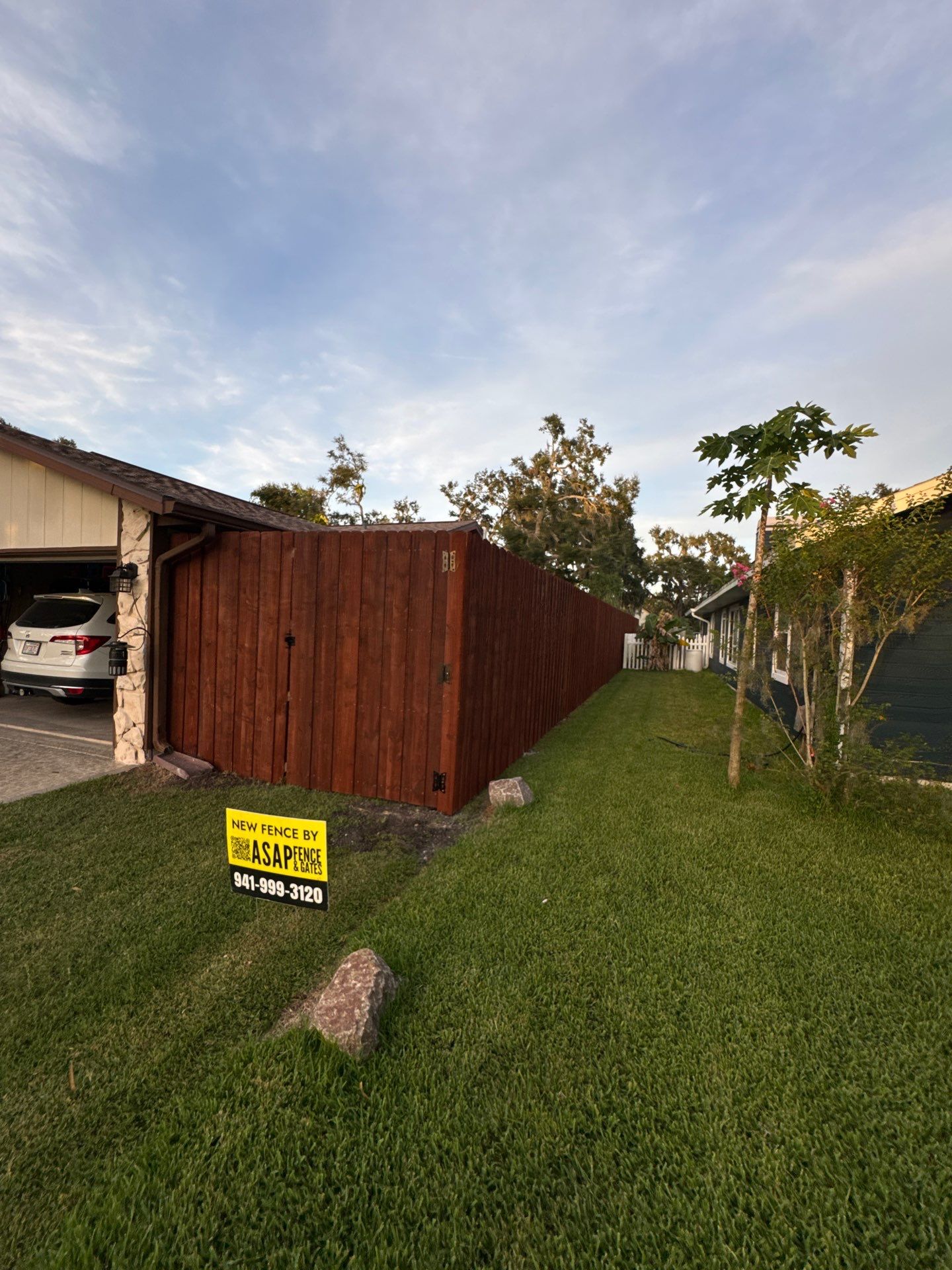 Wood Fence Installation using Pre-stained Pine Board On Board by Asap fence and gates, LLC