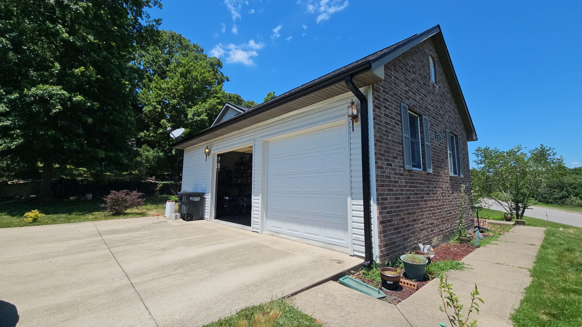 Residential Roof + Gutters & Downspouts & Gutter Guards Install  by Titan Commercial & Residential Roofing 