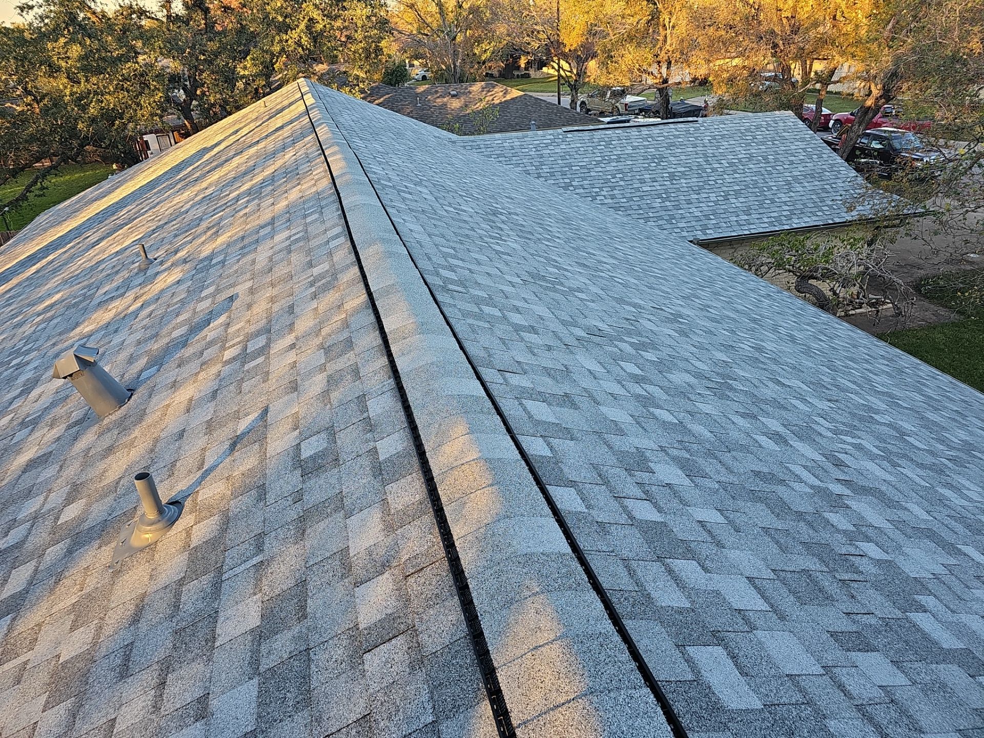 Residential Roof Install IKO Dynasty Froststone Grey by DeZign Roofing & Exteriors