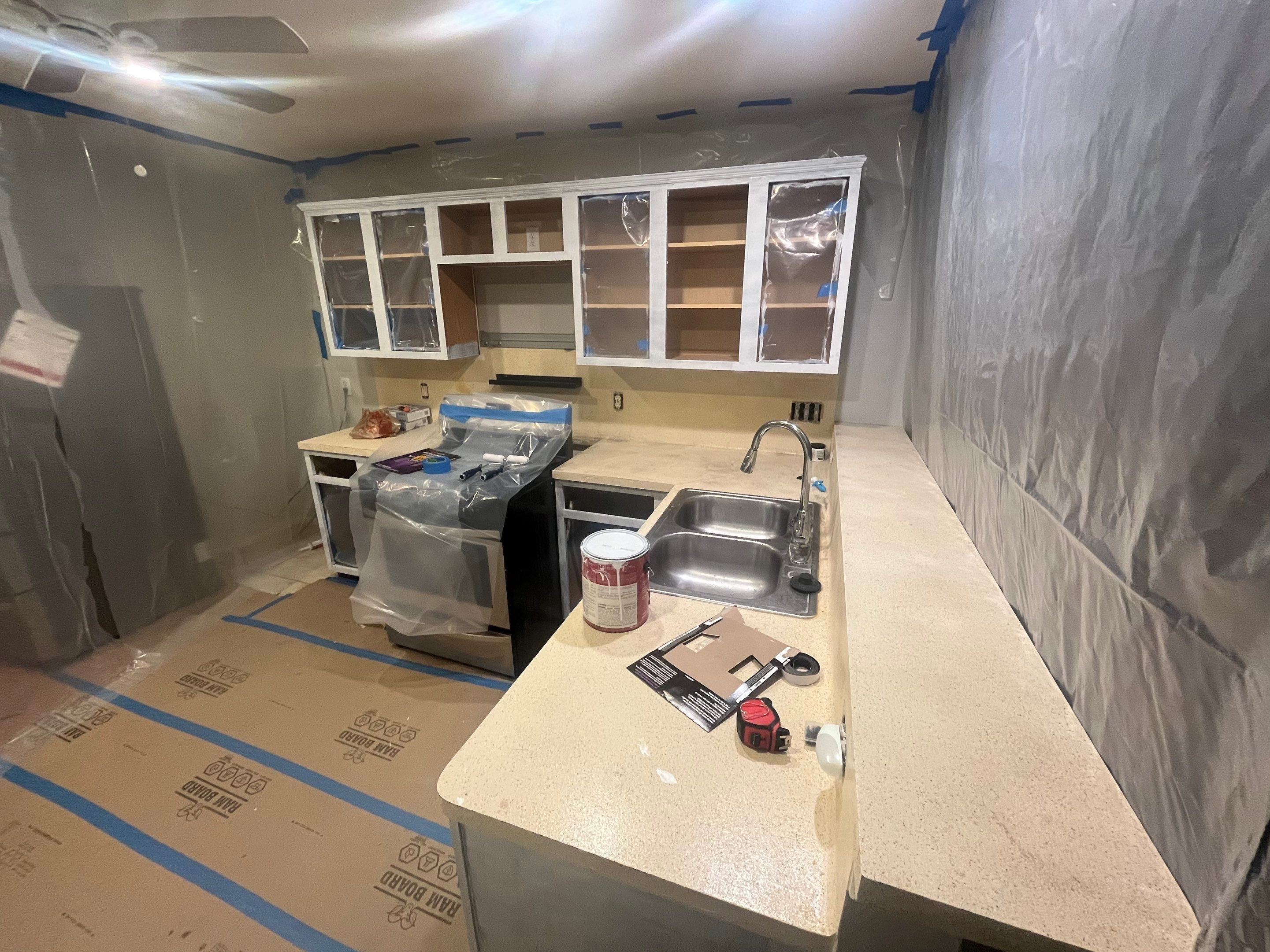 Modern Kitchen Remodel with Blue Cabinetry by Majesty Construction
