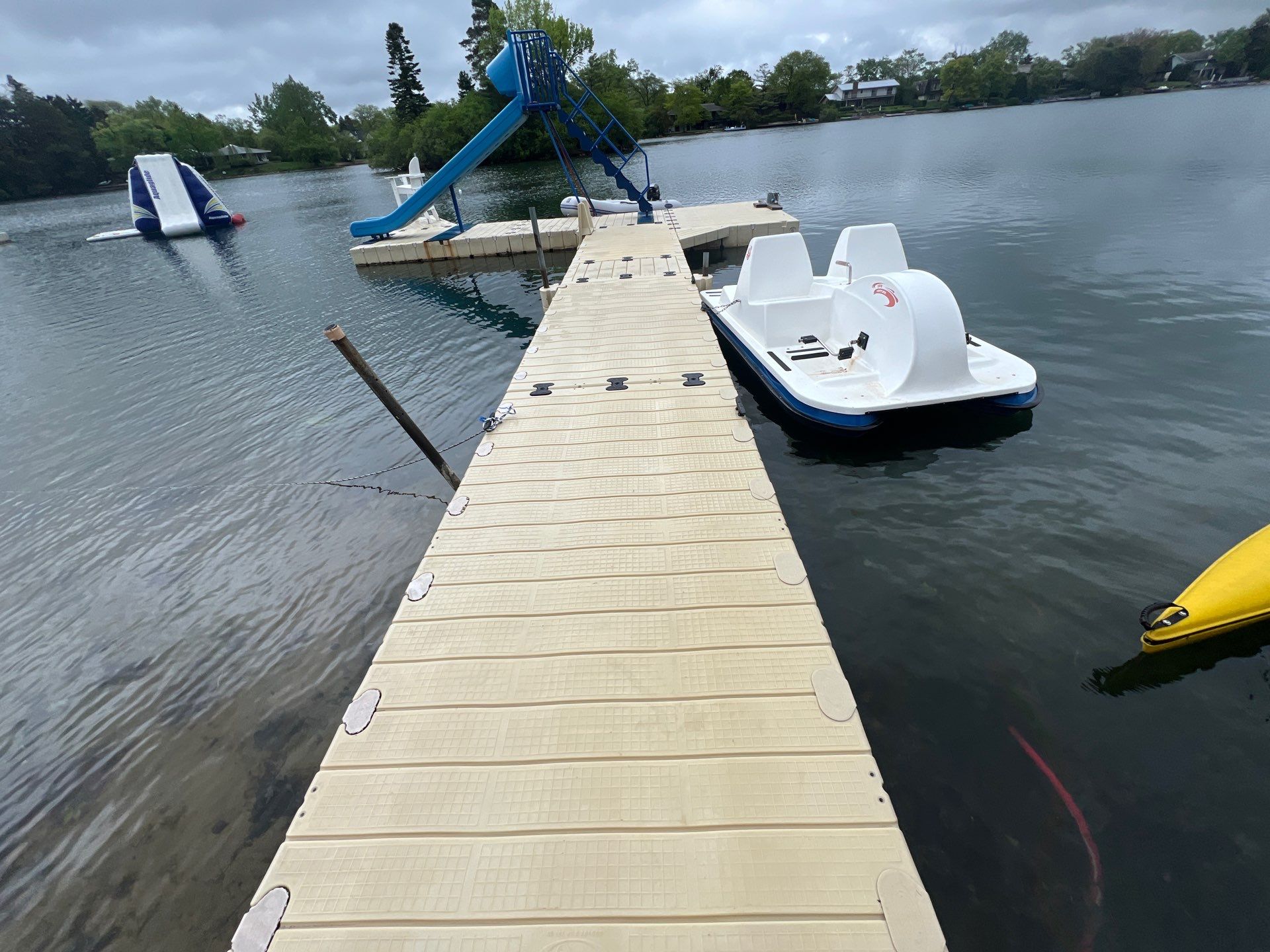 Power washing of floating dock by Northern Power Washing LLC.