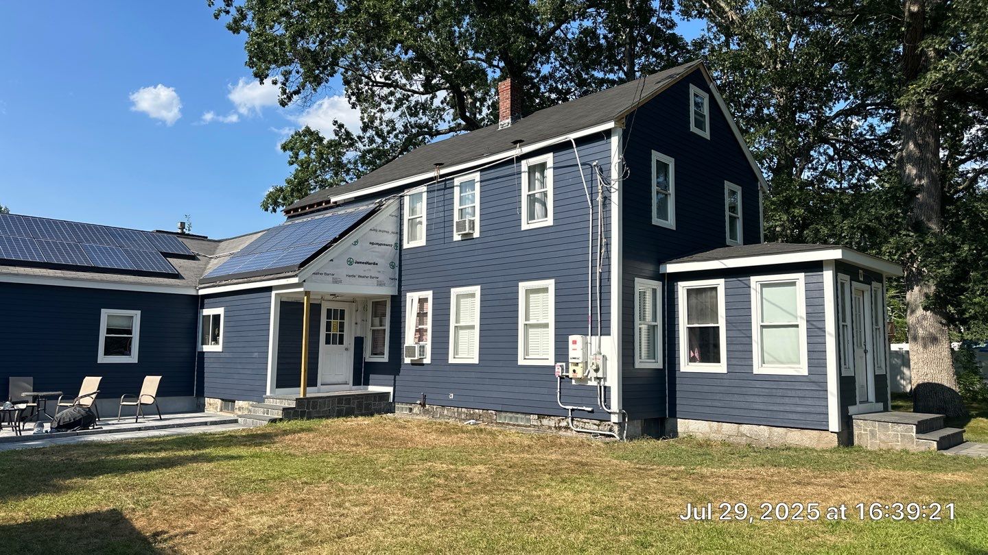James Hardie Lap Siding Installation in Chelmsford, MA by Mighty Dog Roofing of Greater Middlesex County