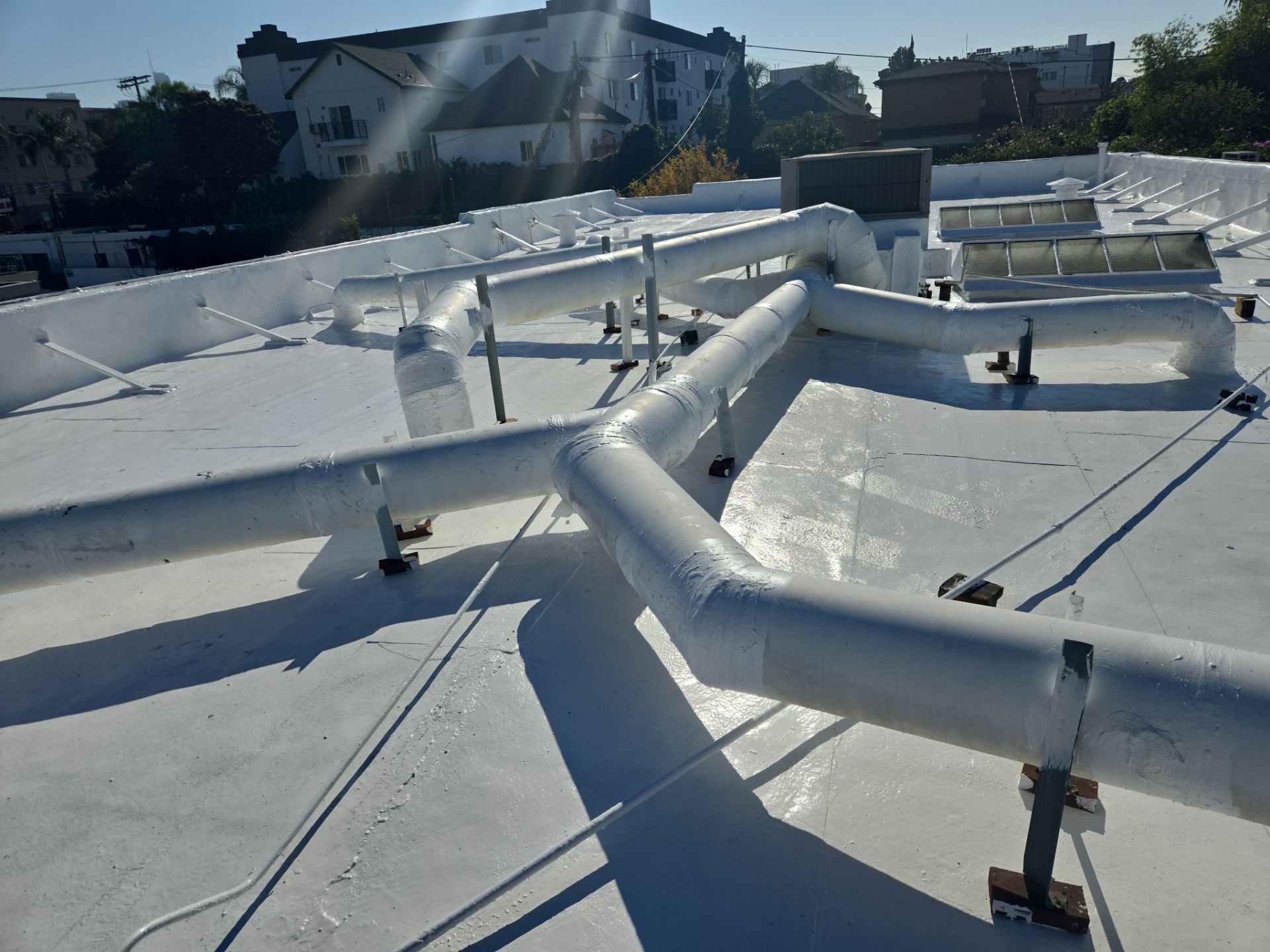 Commercial Roofing Installation using ASC Silicone Membrane by Hull Brothers Roofing