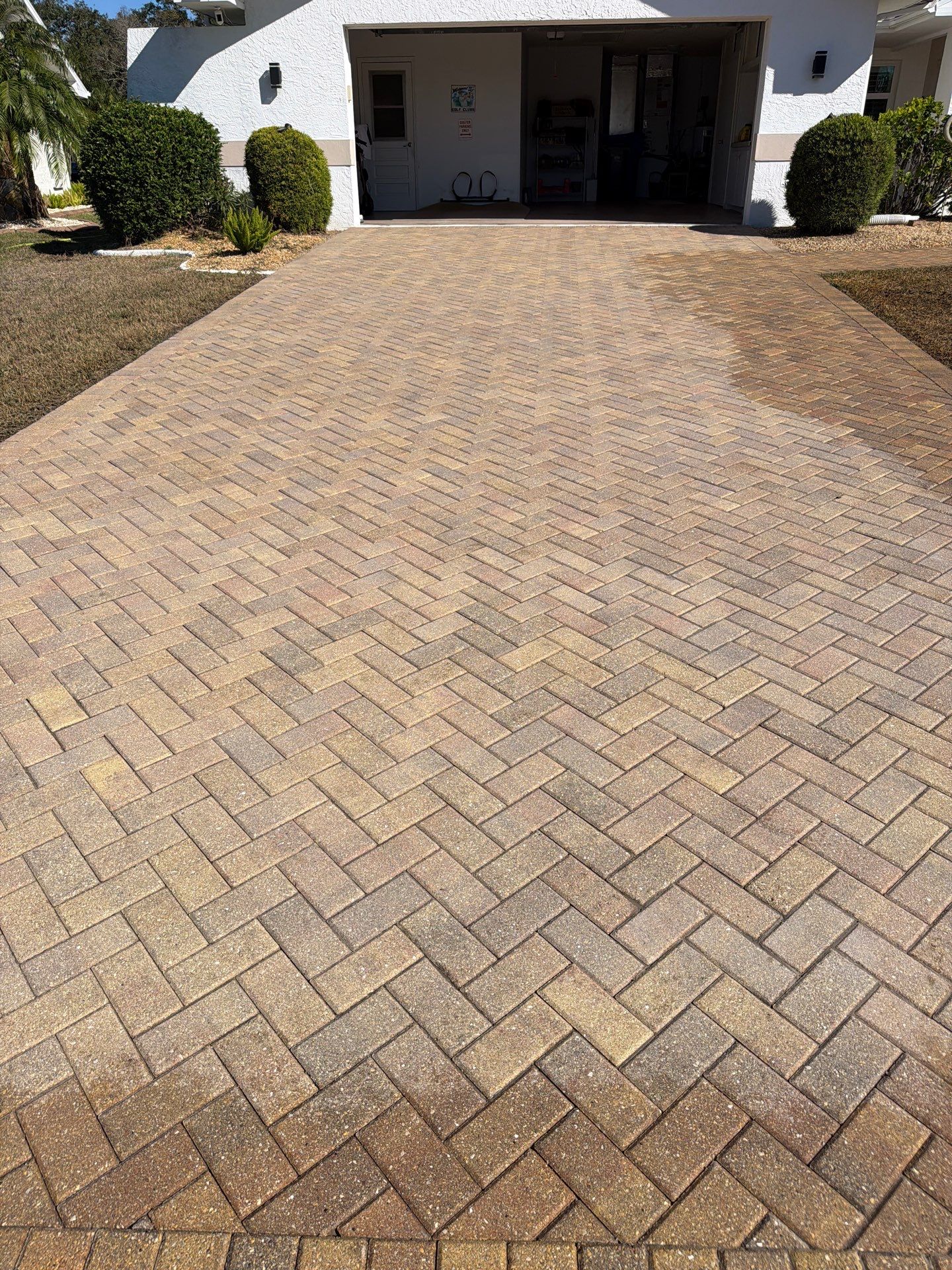Restoring Herringbone Paver Driveway and Walkway in Sun City Center by Supreme Paver Experts