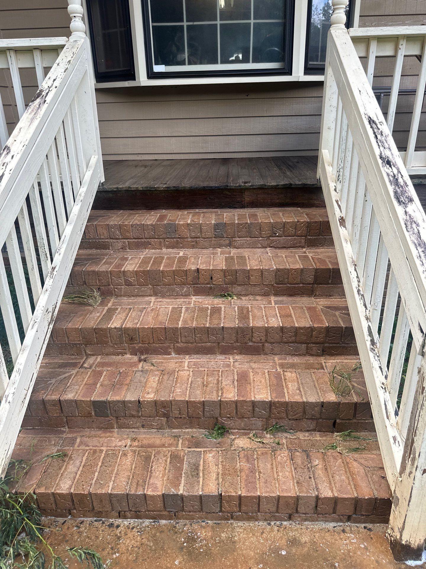 the service shown is pressure washing the brick steps and removing dirt and debris for a clean appearance