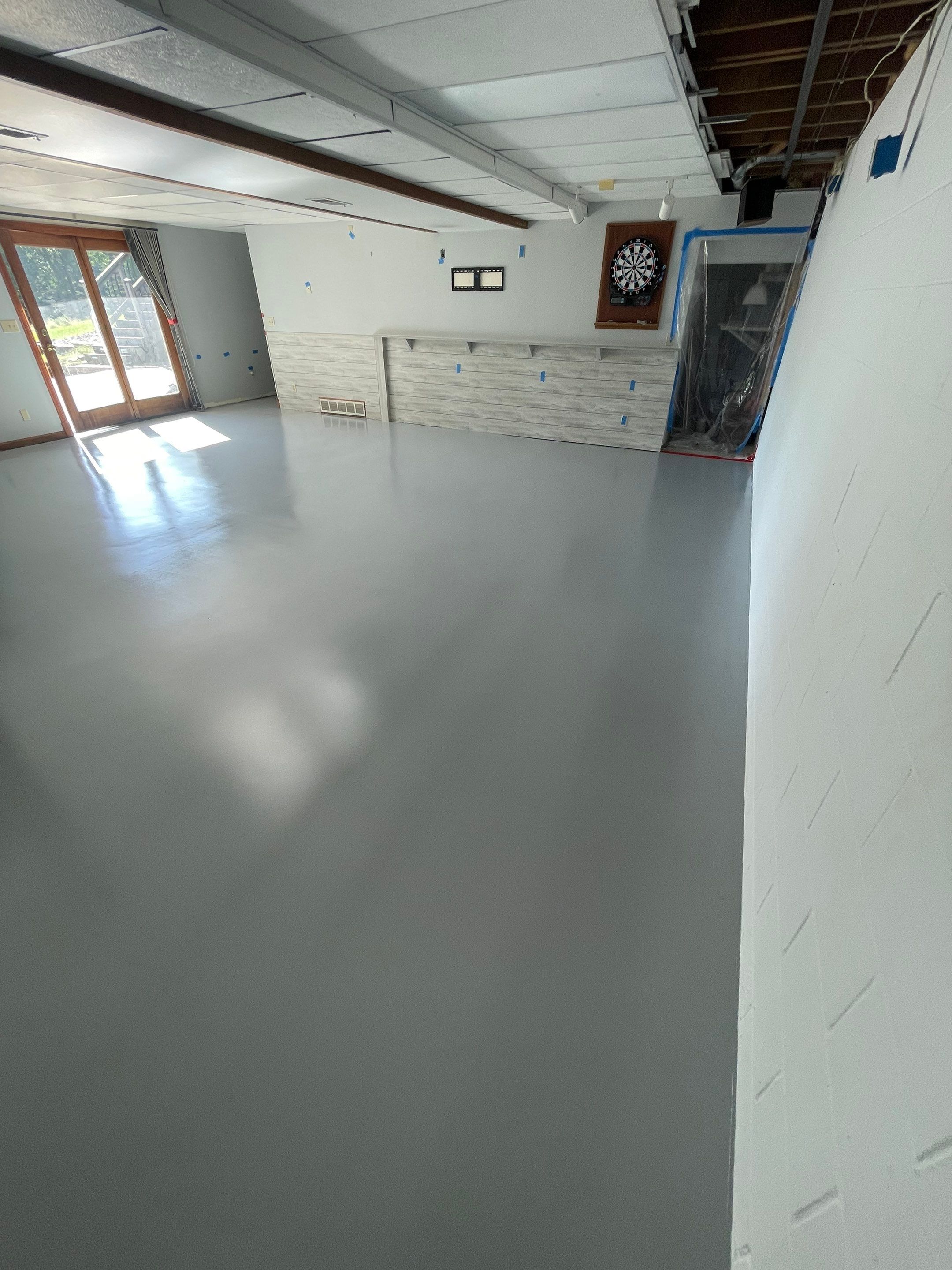 Solid Color Concrete Floor Coating for Renner Basement by Select Painting, Coatings & Garage Cabinets
