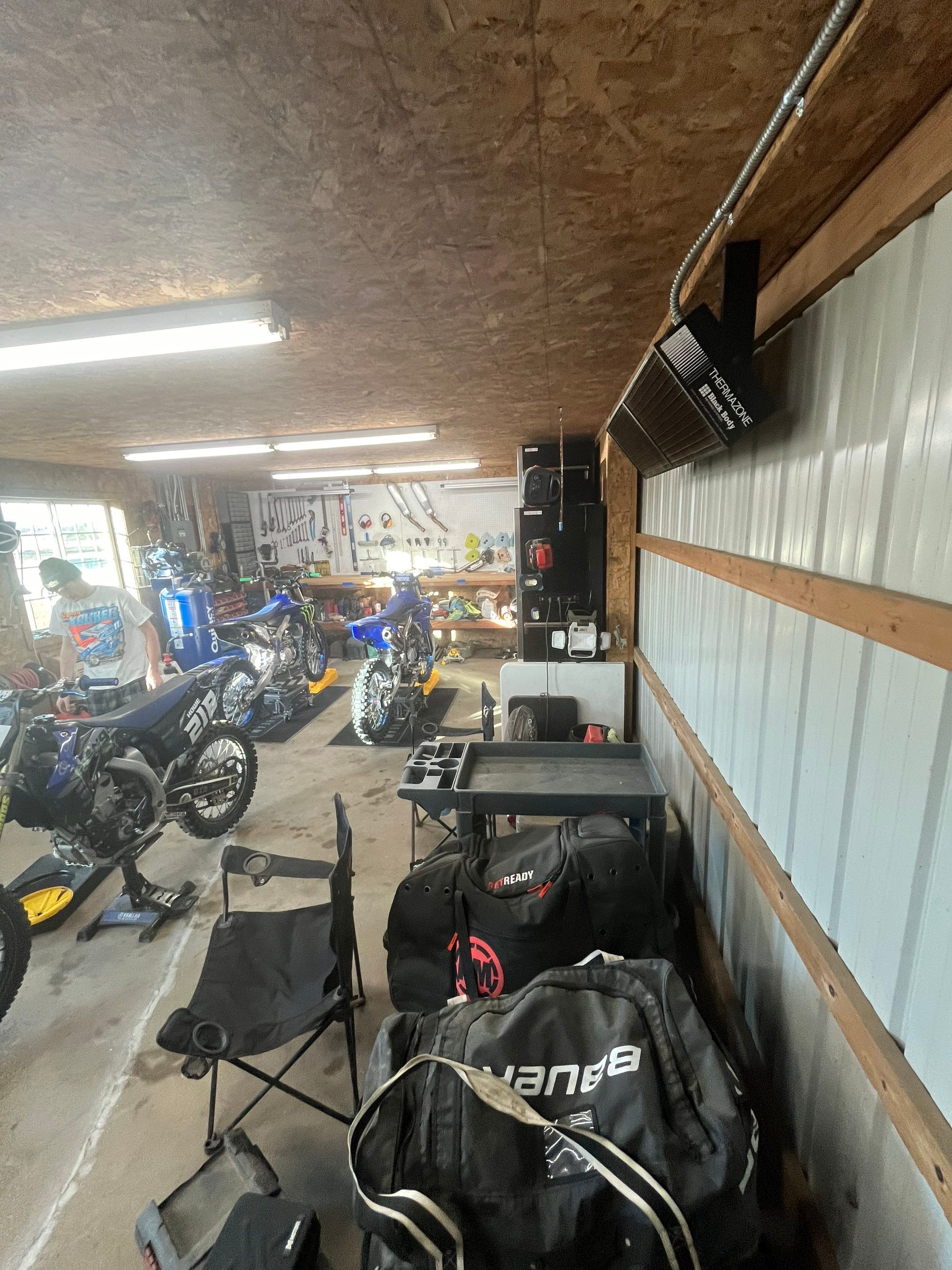 Basement using Tidalwave by Select Painting, Coatings & Garage Cabinets