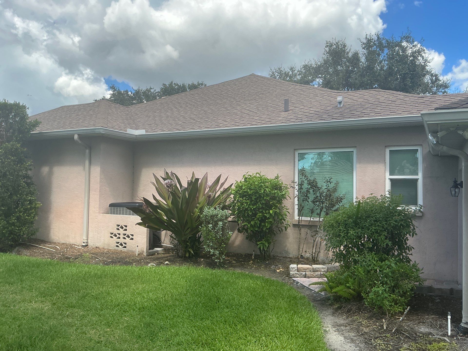 White 6-Inch Seamless Gutters in Sarasota FL by Gutter Professor by Gutter Professors
