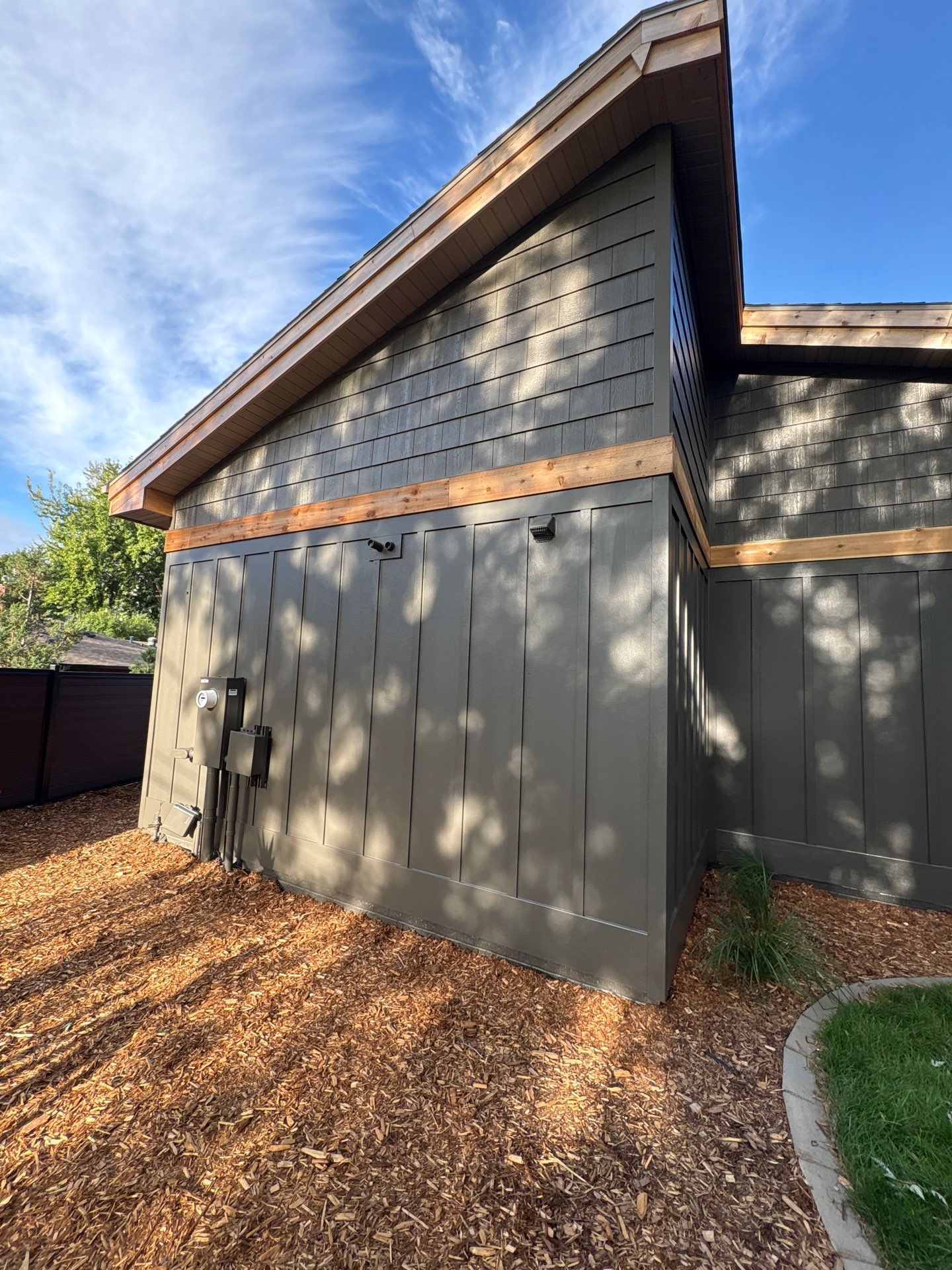 Exterior Siding and Brick Painting for Sioux Falls Garage by Select Painting, Coatings & Garage Cabinets