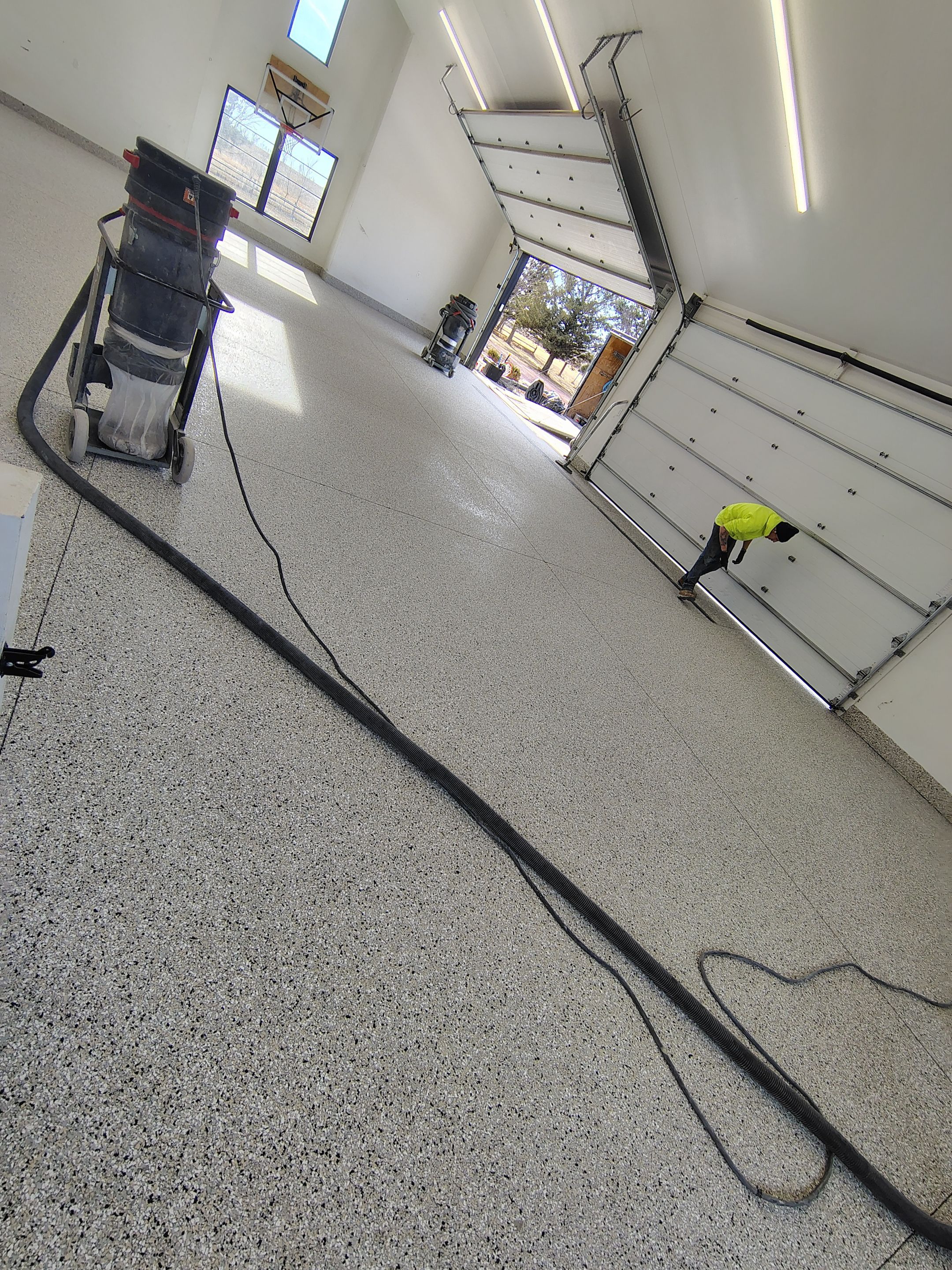 Epoxy Flake Garage Floor and Stair Coating in Sioux Falls by Select Painting, Coatings & Garage Cabinets