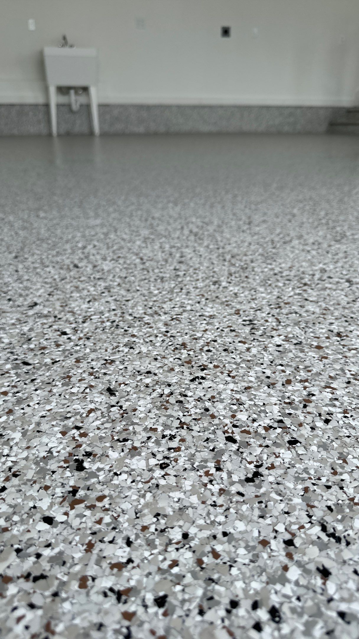 Ben B. completed his home with a new garage floor  by Banner Garage