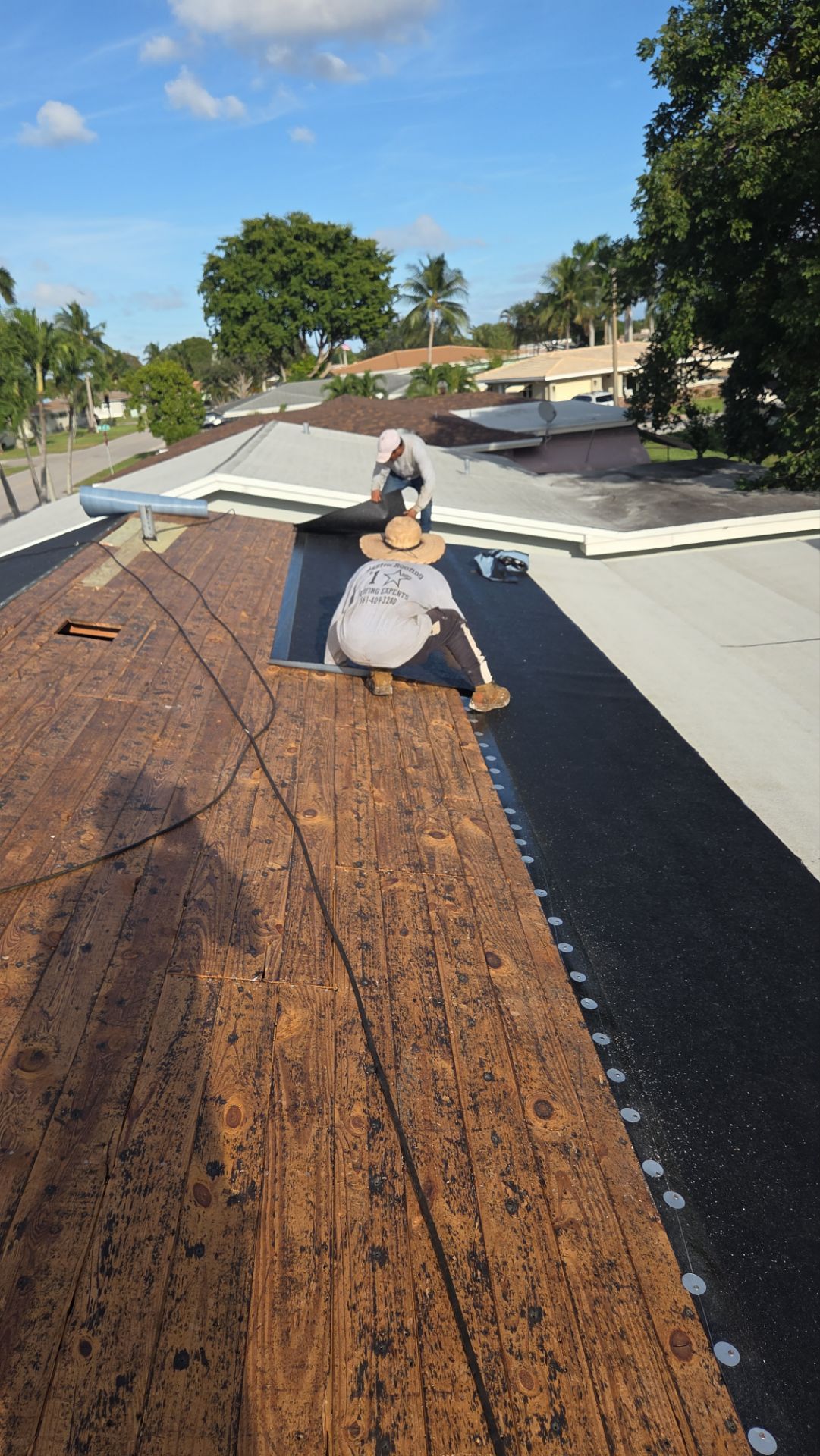Silicone install-- Flat roof by Aastro Roofing