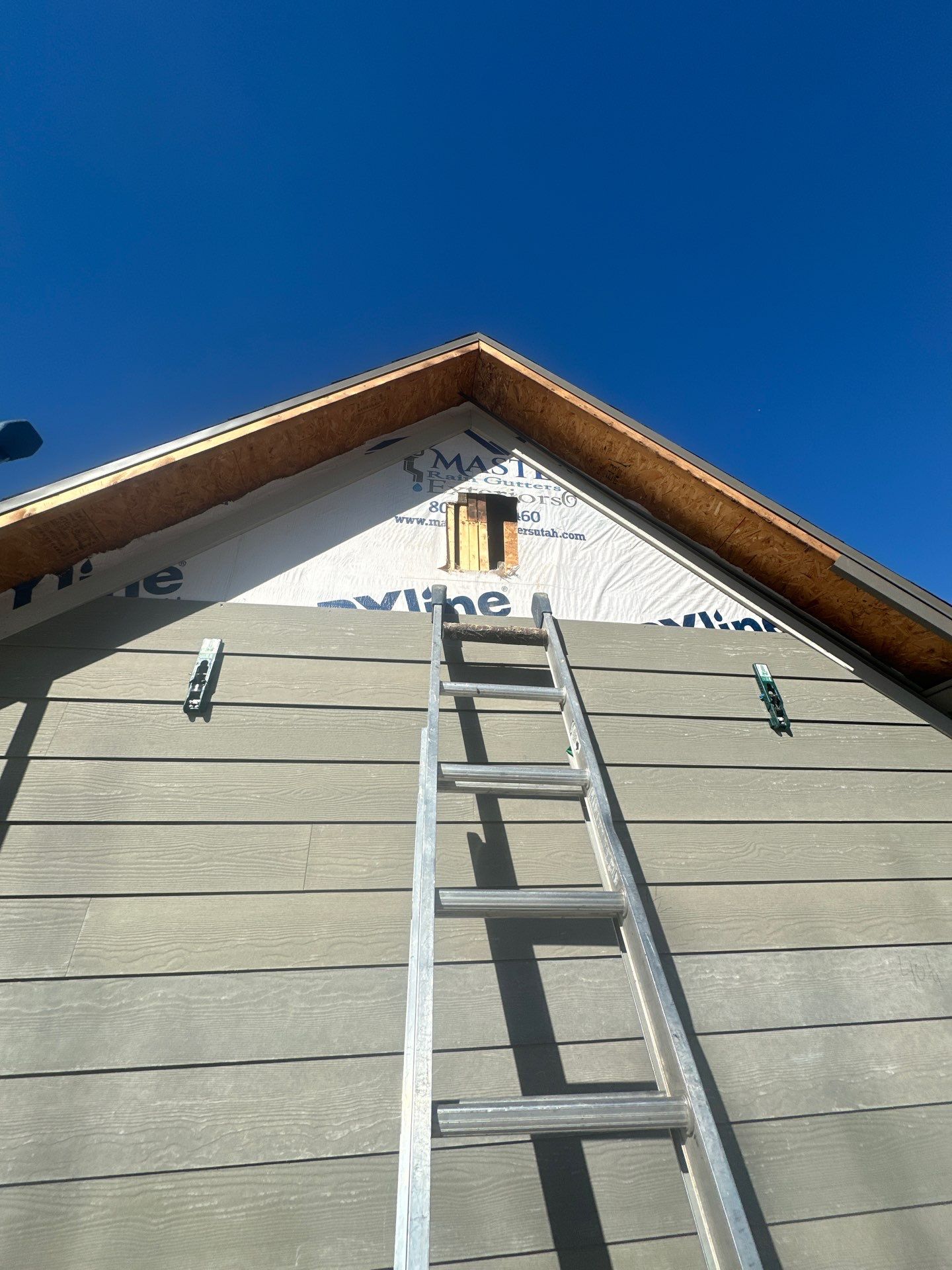 Siding in Lindon by Master Rain Gutters.