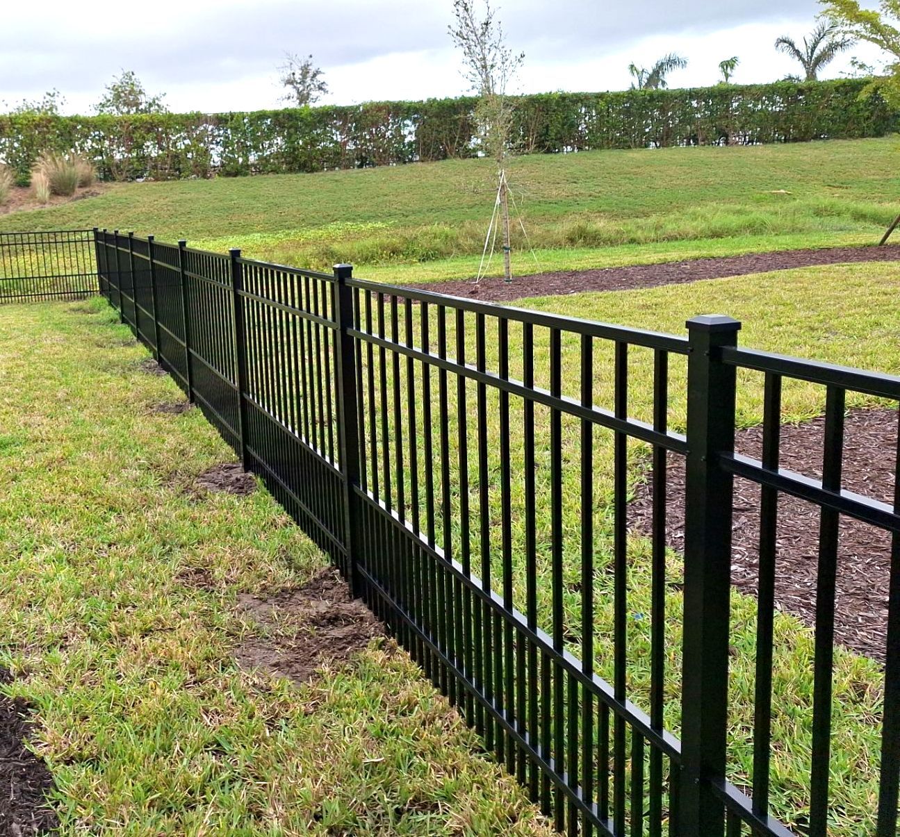 Aluminum Fence Installation using 4ft 3 Rail Black Aluminum Fence by Asap fence and gates, LLC