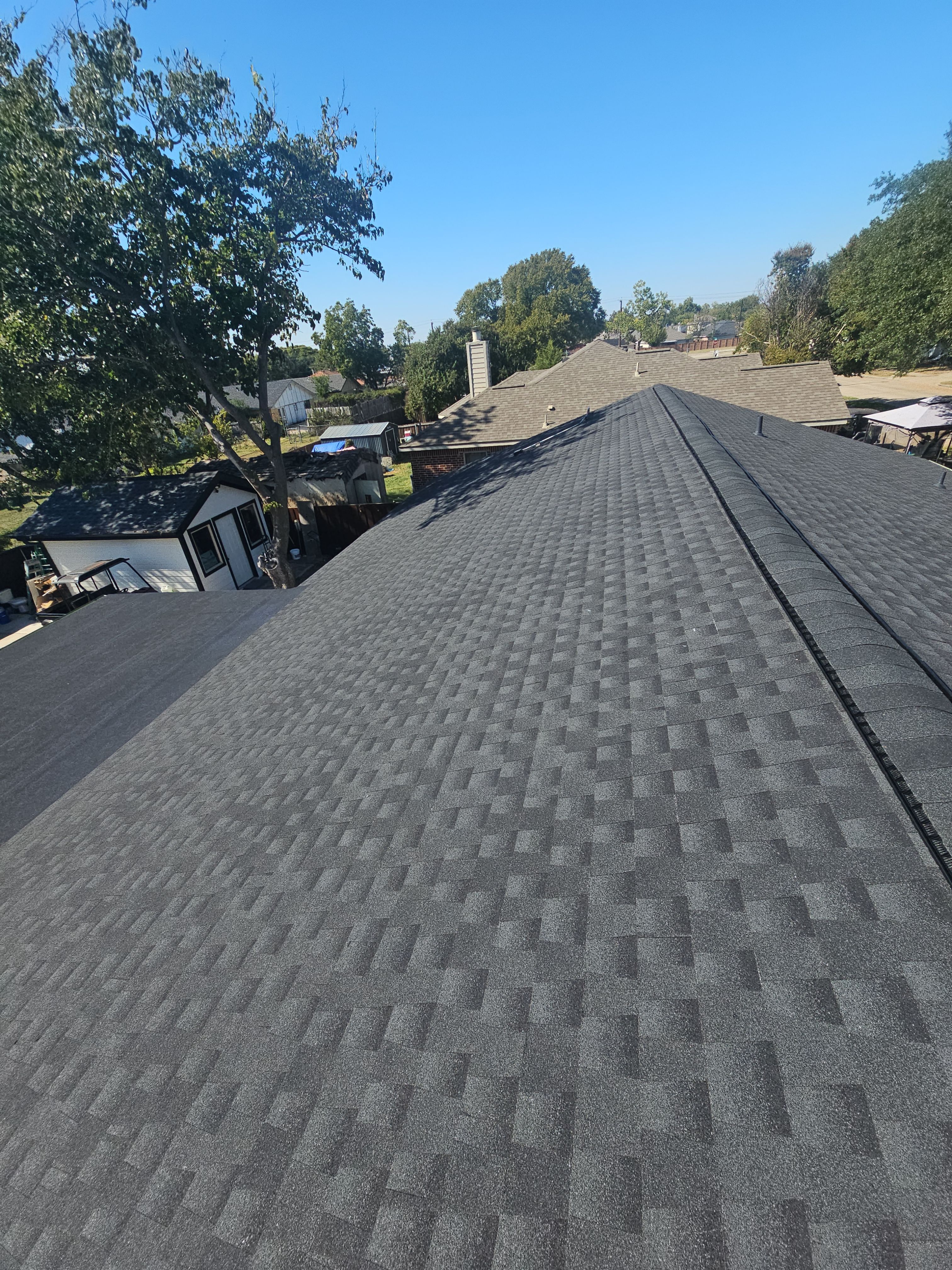 Complete Shingle & Flat Roof Replacement in Garland, TX by road roofing llc