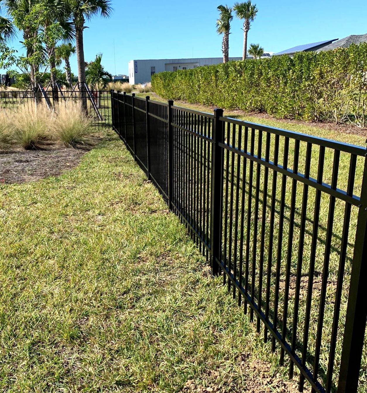 Aluminum Fence Installation using 4ft 3 Rail Black Aluminum Fence by Asap fence and gates, LLC