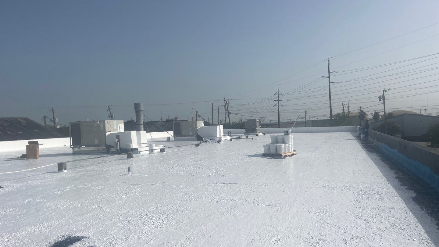 Dirty leaking Gravel Roof by Bayfront Roofing and Construction