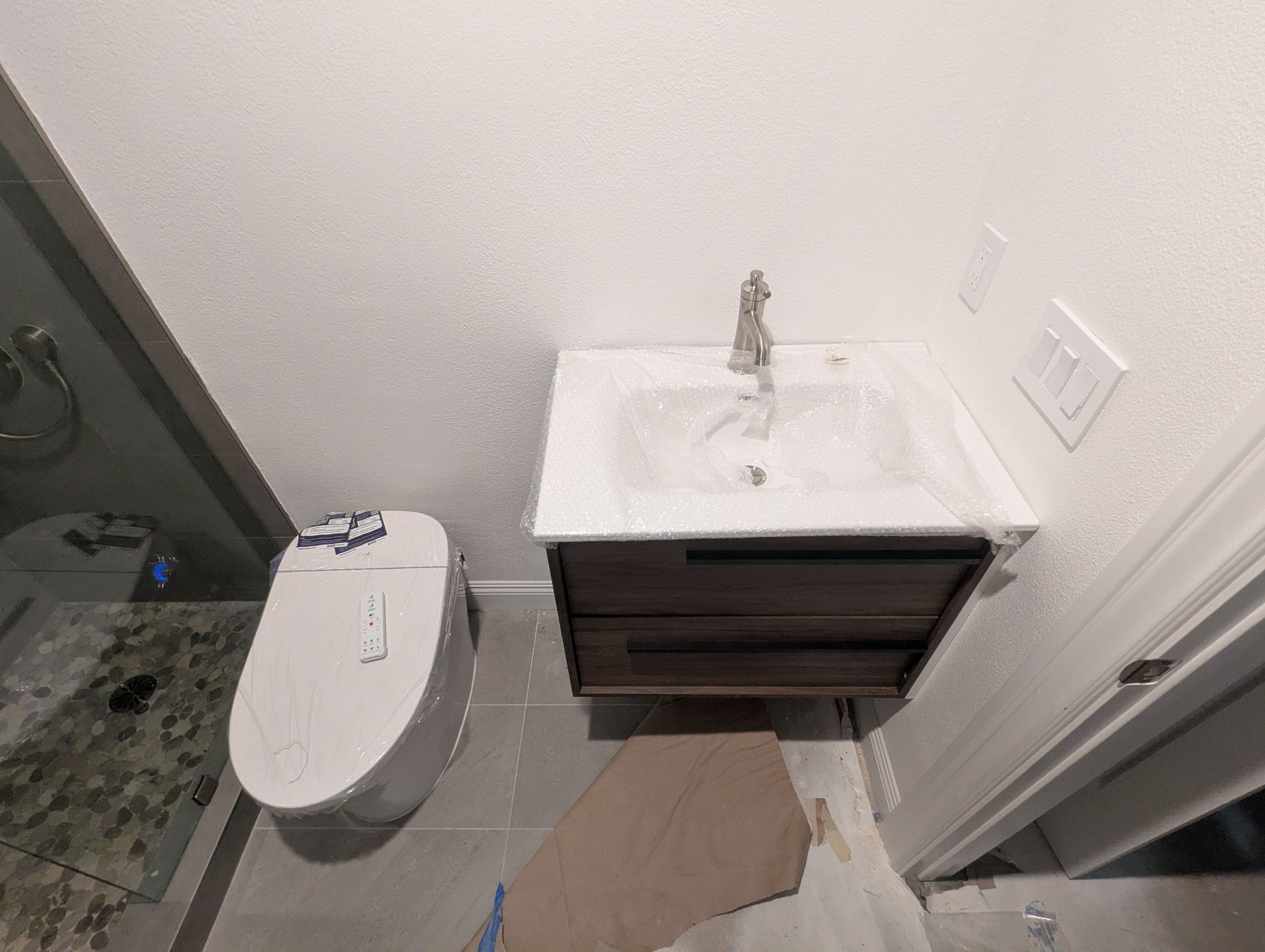 Setting Finish in a new Custom Home by Professional Plumbing Inc 