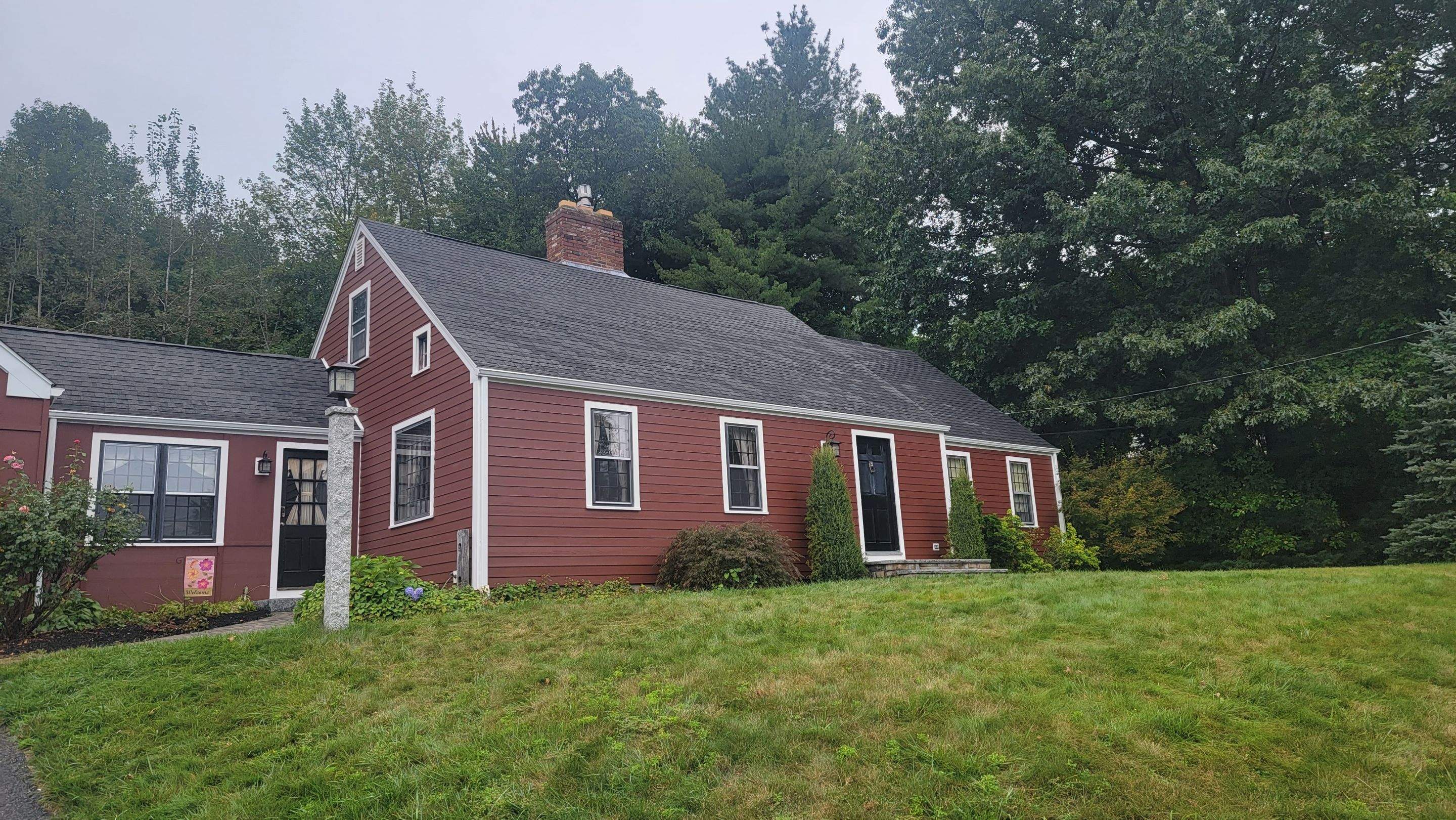 Siding Installation using James Hardie Countrylane red by UBrothers Construction