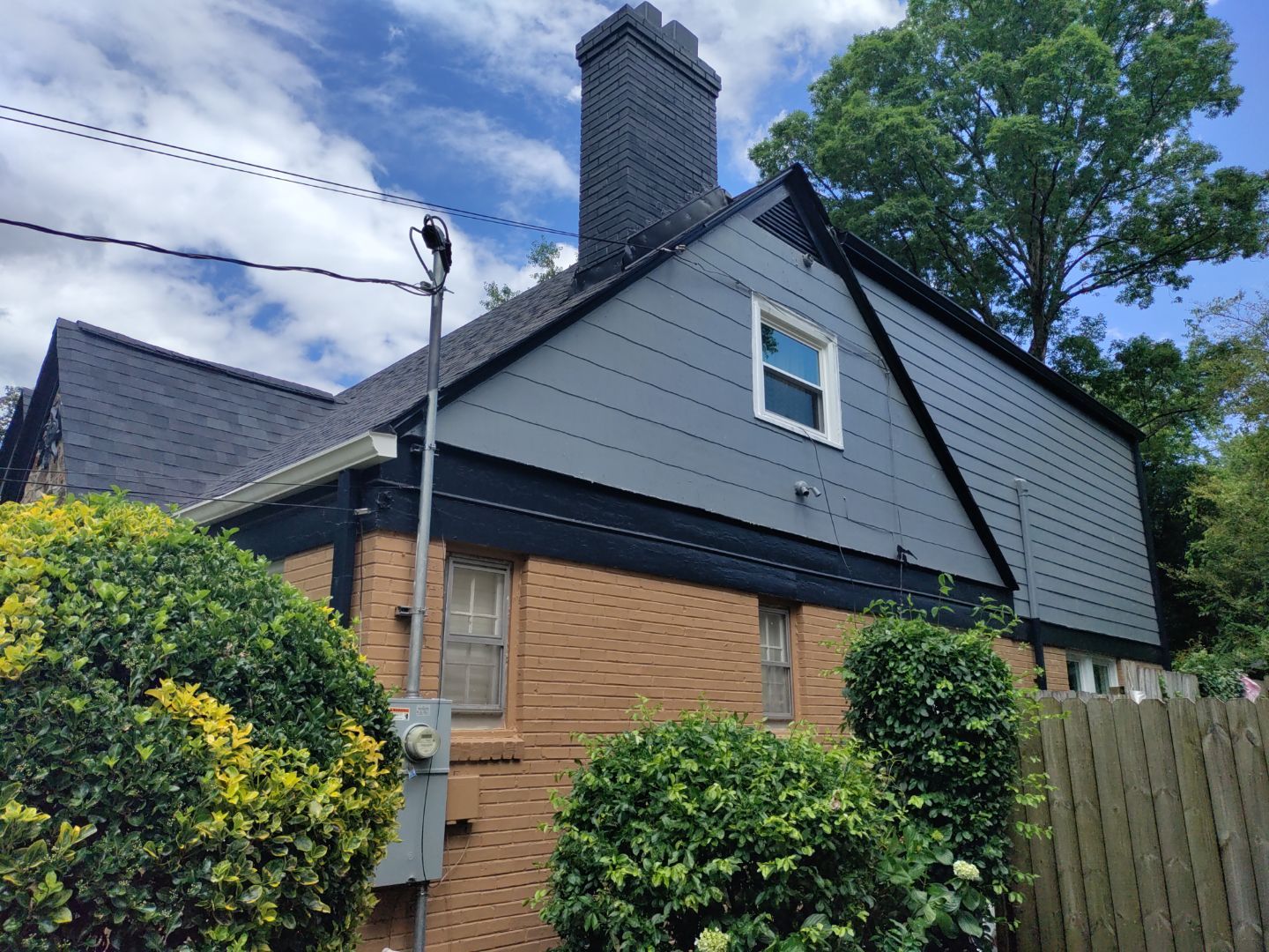 Residential Roof Replacement using Owens Corning Trudef Twilight Black by Inspector Roofing and Restoration