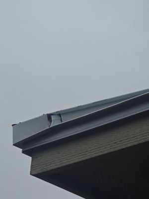 Extreme close up of metal roof edge trim.