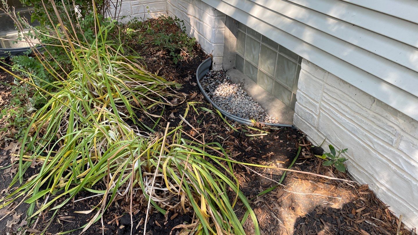 Drain Tile, Window Wells & Buried Discharge in Minneapolis by Waterproofing Northeast