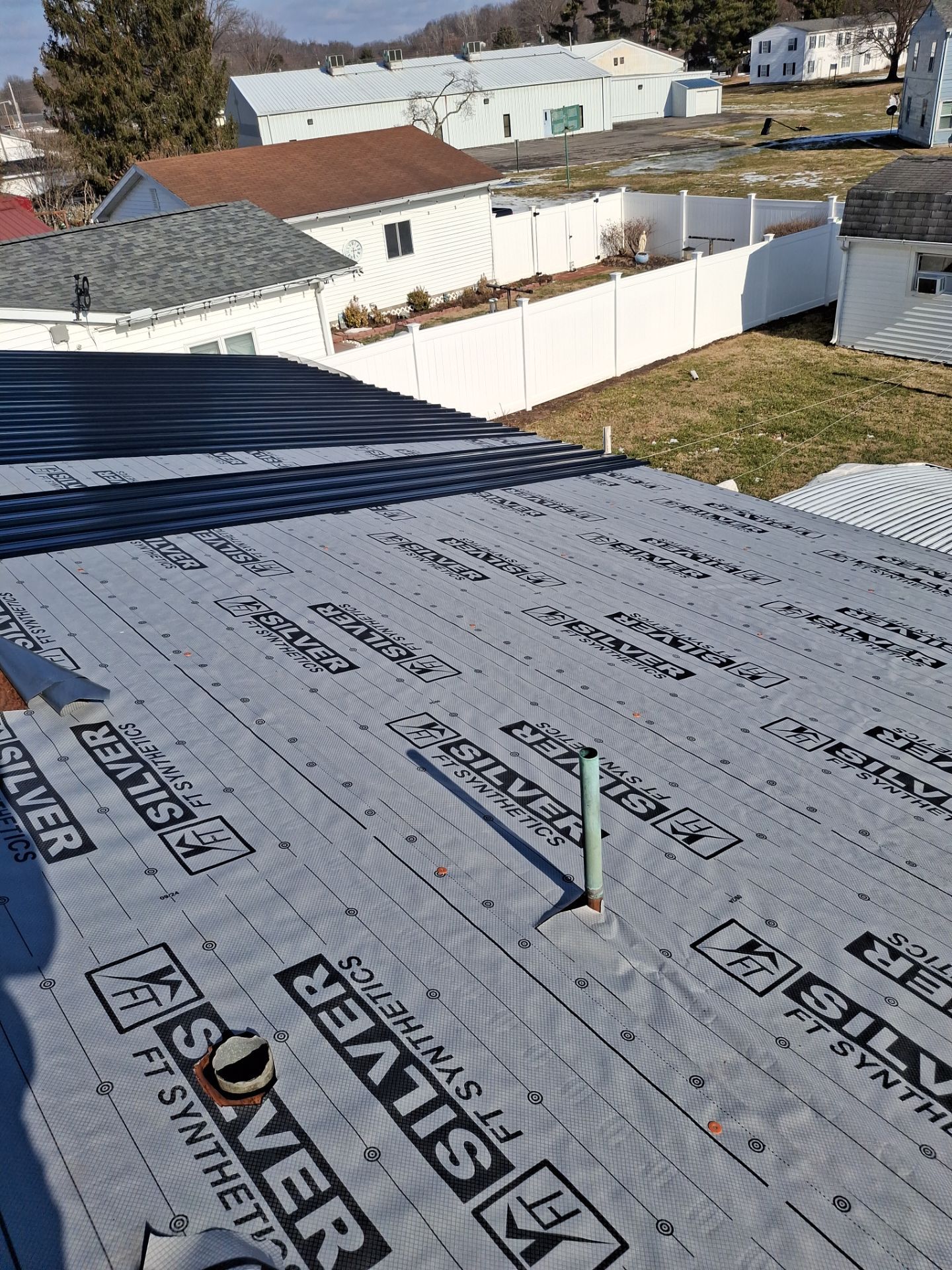 Residential Roofing Installation using Metal by Rainstoppers Roofing