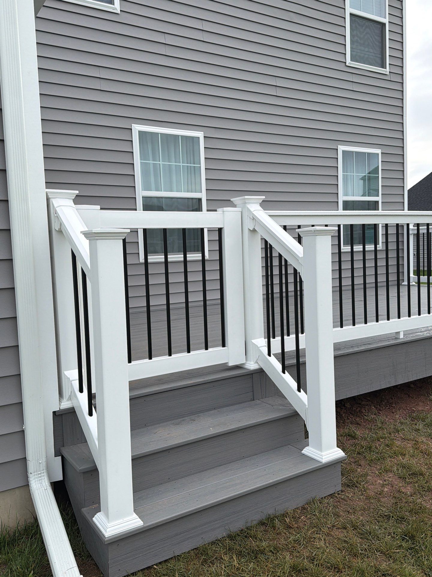 Custom Gray Composite Deck Installation in Duncannon by Esh Builders