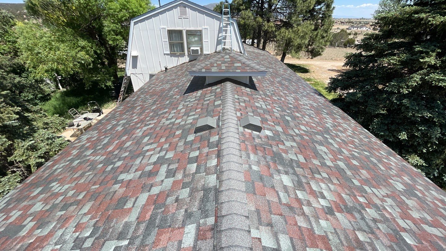 Architectural Shingle Roof Replacement with gutters and downspouts for Edgewood Home by Doyle Roof Masters Inc