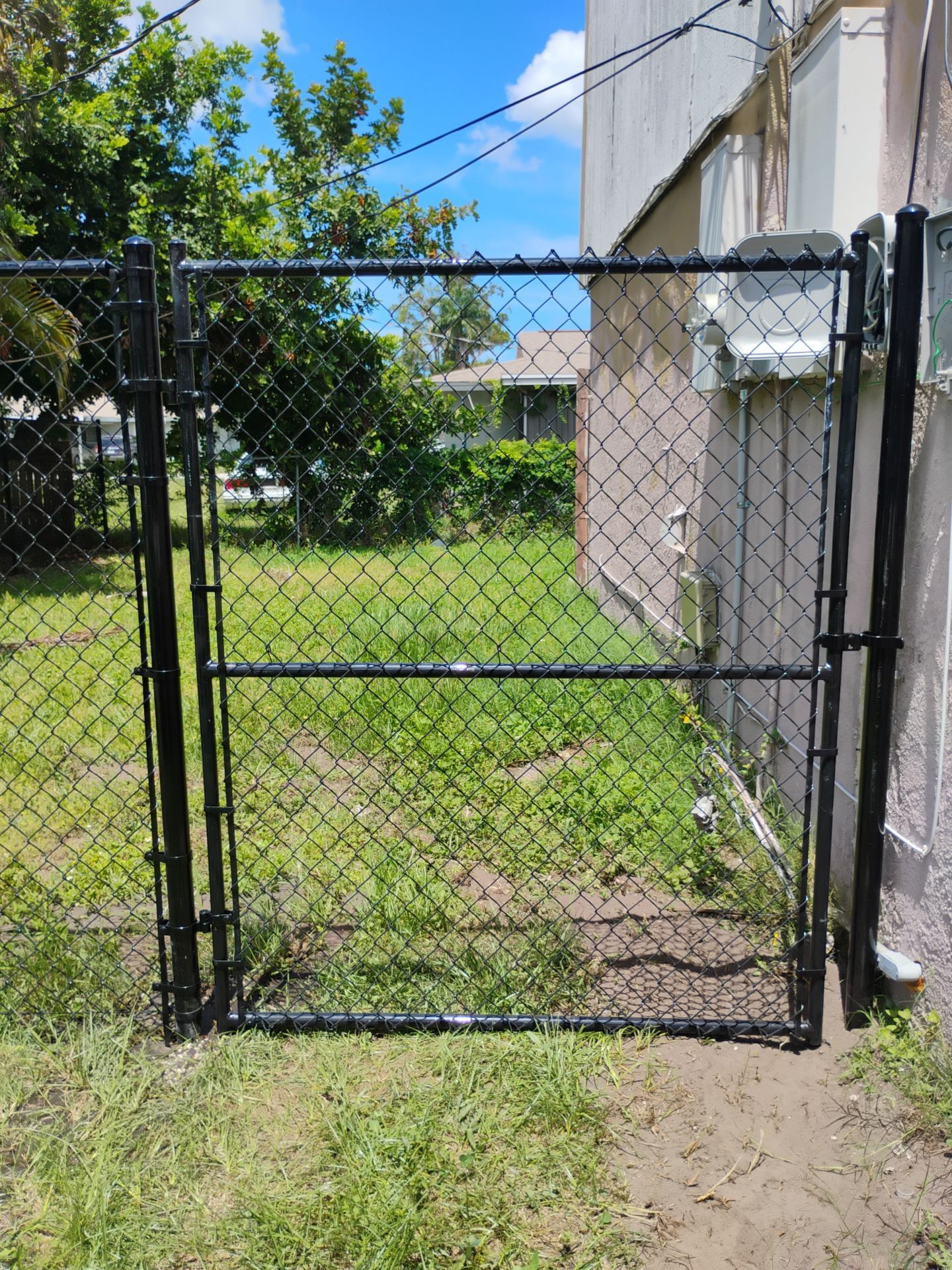 Black Vinyl Chain Link Fence Installation in Bradenton by True Fence LLC