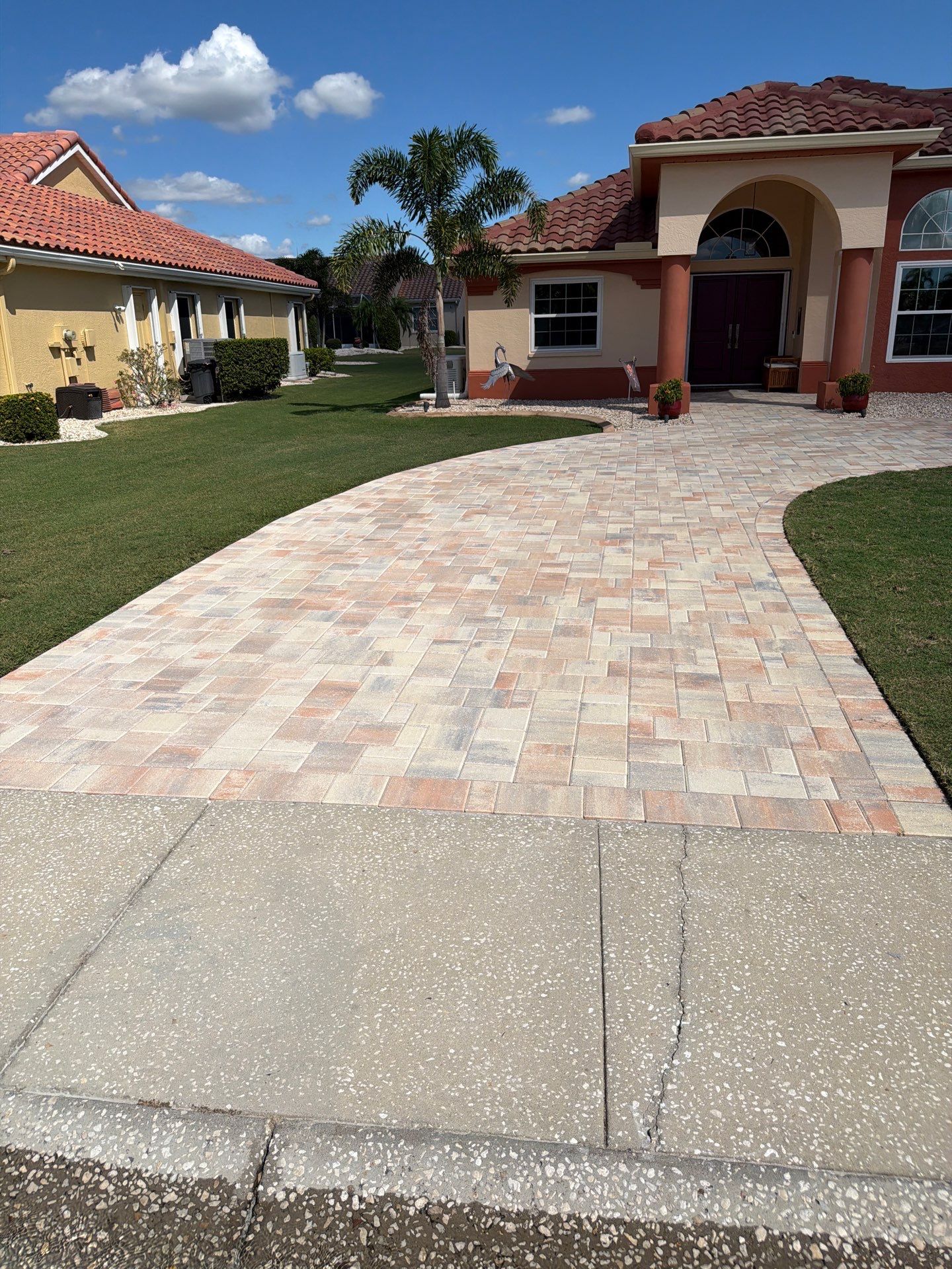 Professional Paver Sealing for this beautiful Driveway in Sun City Center by Supreme Paver Experts